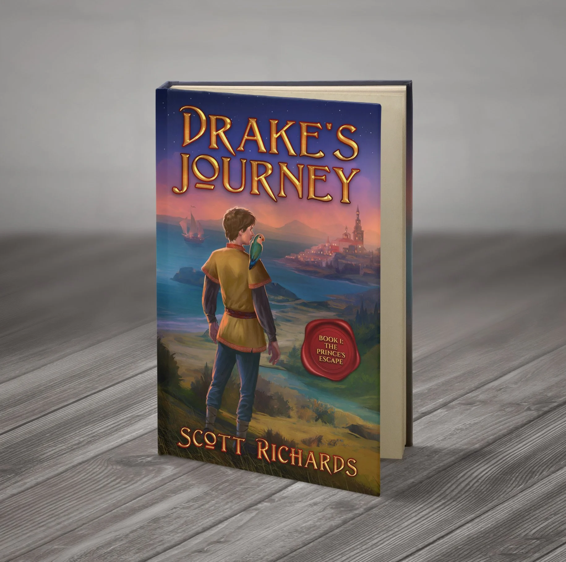 A hardcover book titled "Drake's Journey" standing upright on a gray wooden surface. The cover features an illustration of a young person with a bird, sailing ships, a coastal town, and a sunset sky.