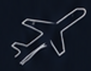 Airplane shape illuminated against a dark background