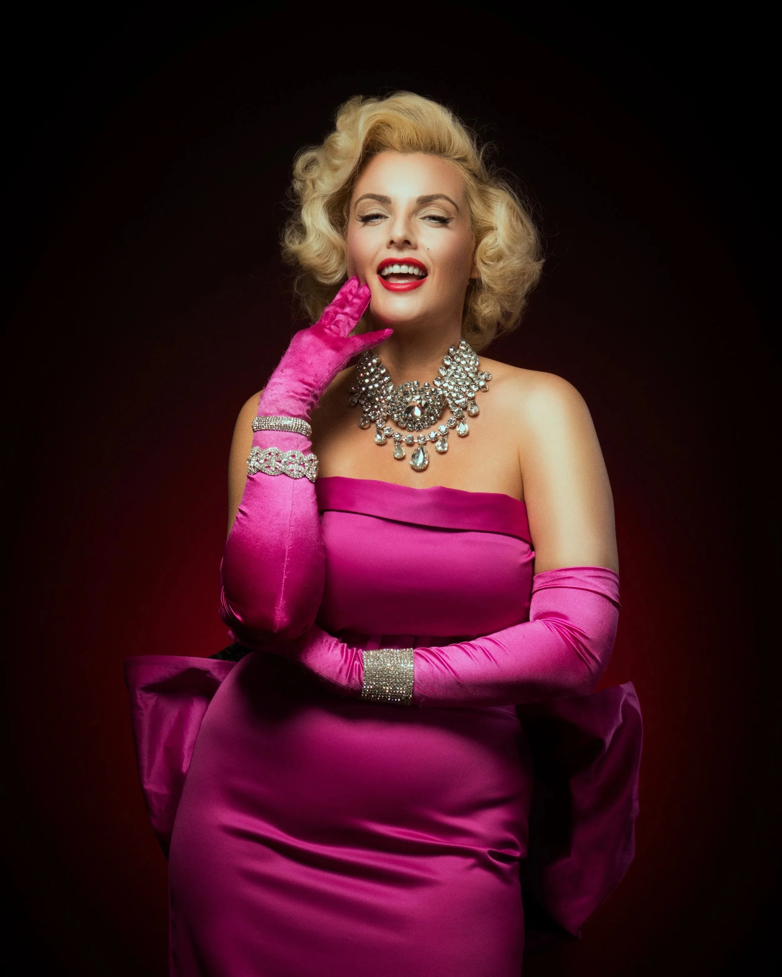 Marilyn Monroe tribute artist Isabella Bliss wearing a replica Diamonds Are a Girl’s Best Friend pink dress