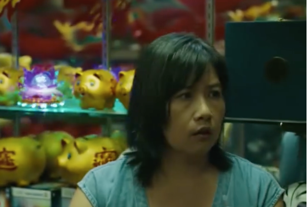 Still image from "Mr. & Mrs. Smith" pilot episode, featuring Angela Chew.