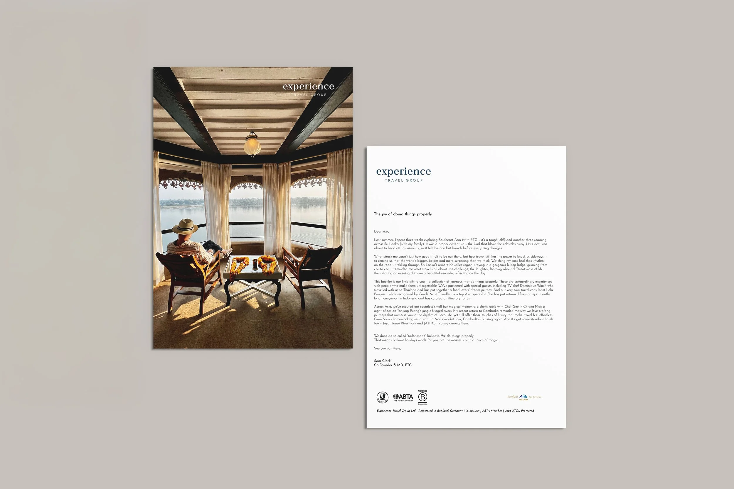 A printed brochure or flyer with images and text, showing an interior scene with a view of a river or lake from a window, curtains, and a person sitting on a chair wearing a sun hat. The other side contains a letter or article about travel experience
