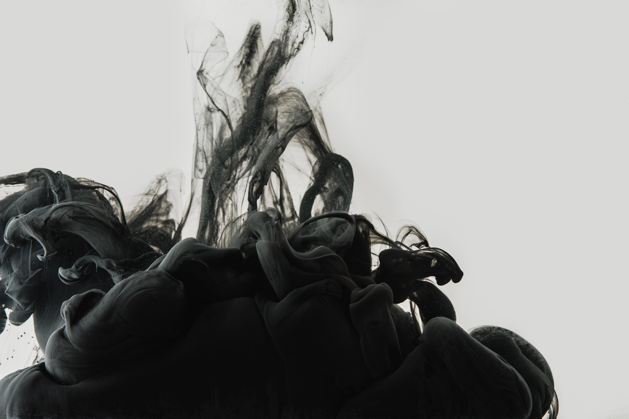 close-up-view-of-black-ink-in-water-isolated-on-gr-2026-01-06-00-26-57-utc.jpg