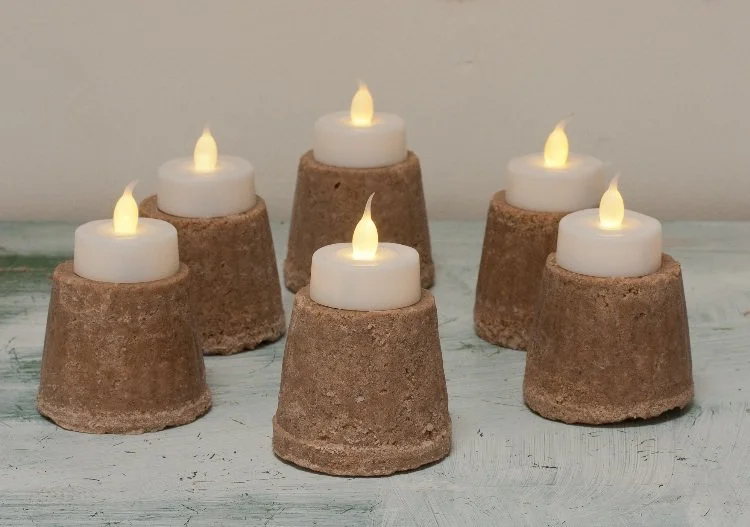 Vigil, Assemblage tealights and sculptural forms in sand and wax 