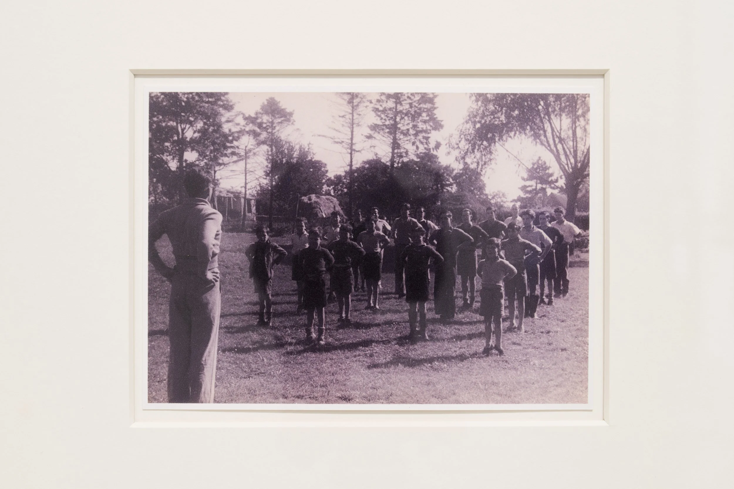 Look Well After Yourself, 2024, Photographs from Boué’s family collection feature her father leading a group of Basque children through a series of exercises in Oxfordshire, in June 1939. When newly exiled from Spain, caring for the niños was his fir