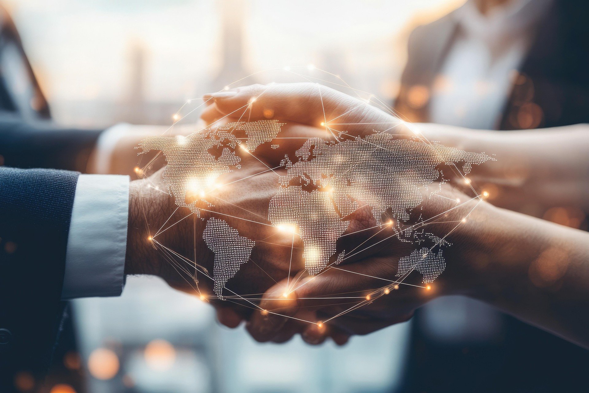 Two business professionals shaking hands with a digital world map overlay indicating global connectivity.