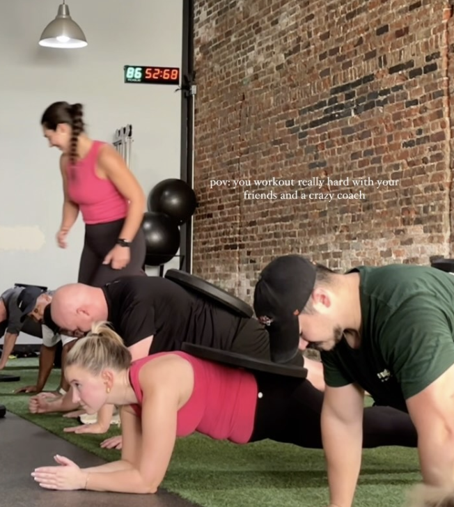 Coaching group class at Performance House Gym.