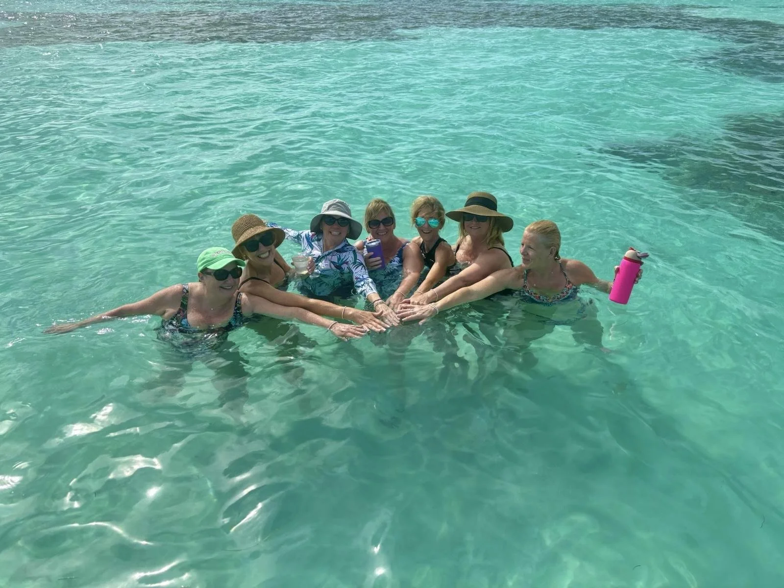 Enjoying the Caribbean Sea with Friends and a Cold Drink