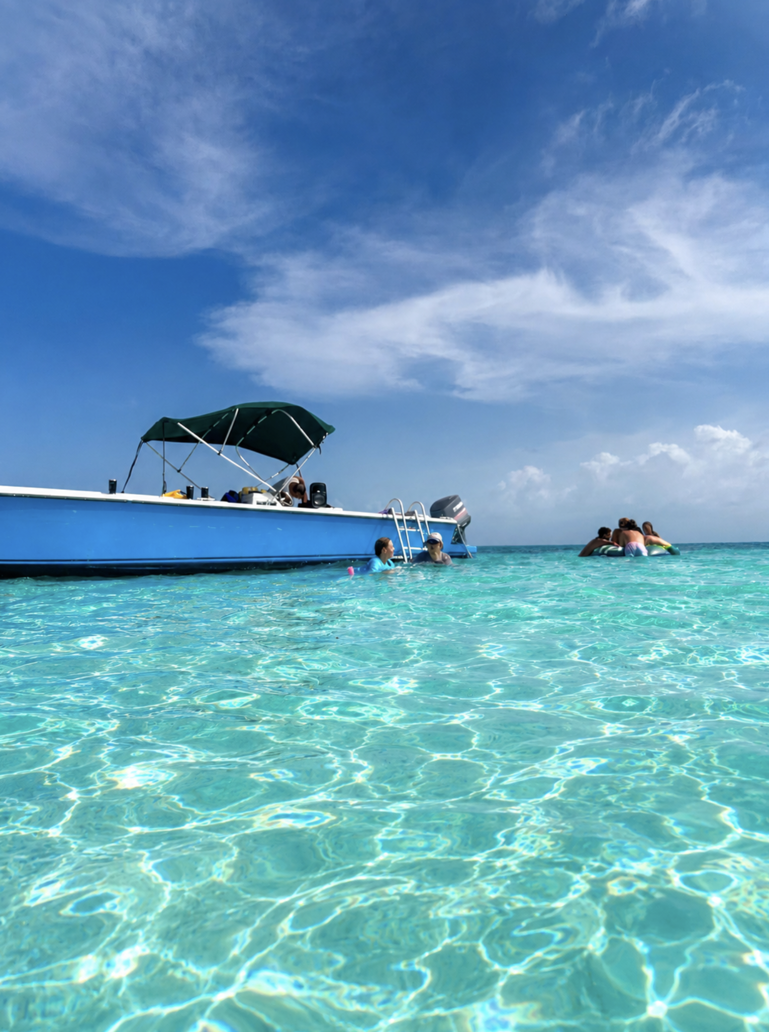 Casa Al Mar Guests enjoying the Clear Caribbean Sea next to the private guide and everyone smiling