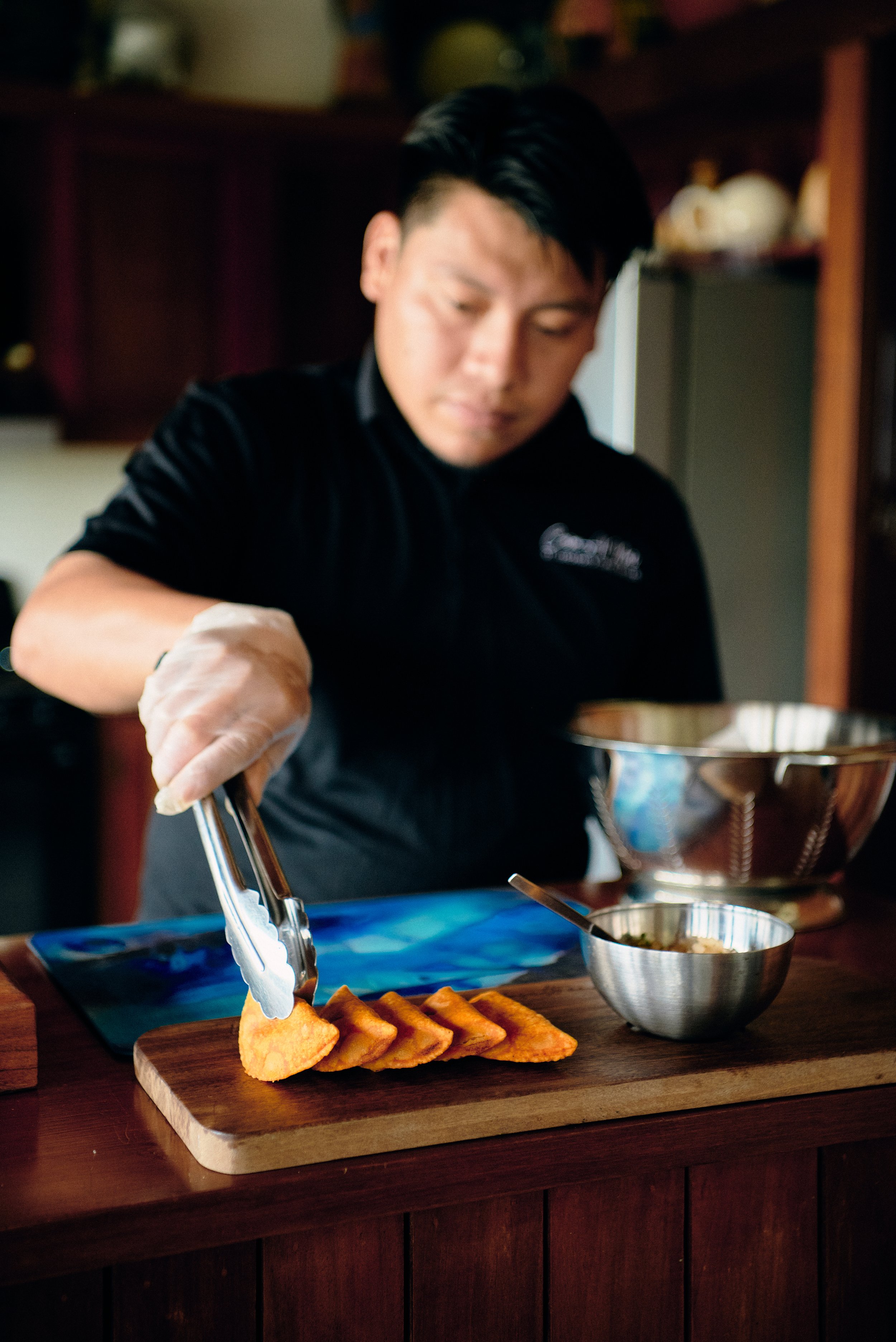 The chef at the open kitchen at Casa Al Mar.