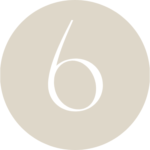 A beige circular background with a large white number six in the center.