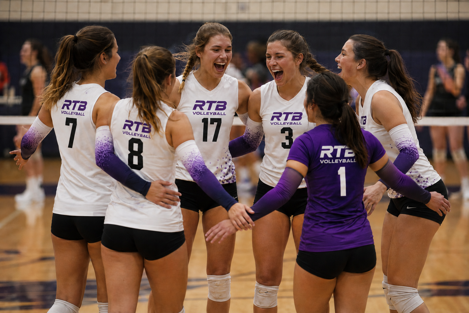 RTB club volleyball team celebrating on the court during an RTB Volleyball match in an indoor gymnasium
