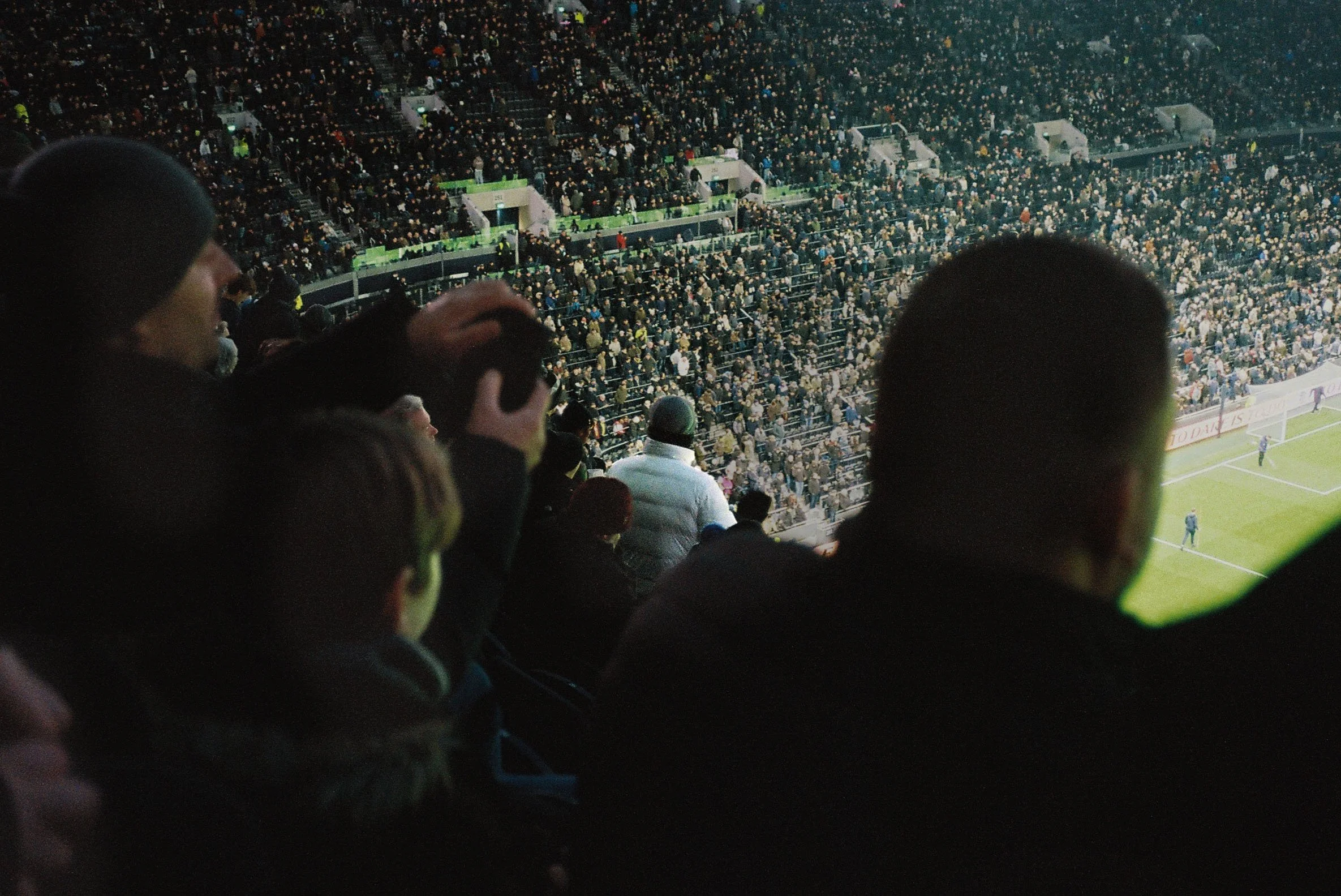 white jacket man in crowd.jpg