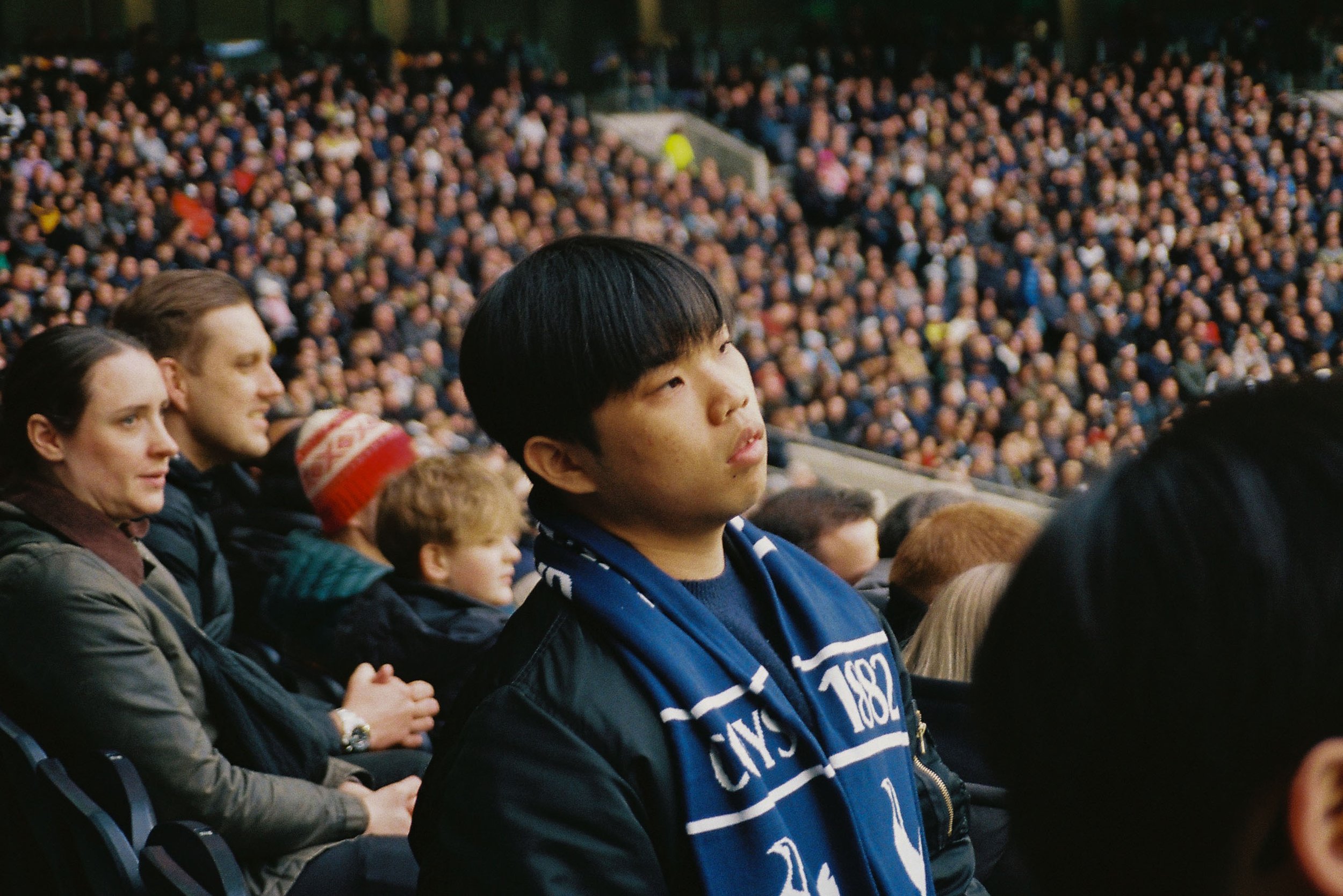 boy in scarf watching v west ham.jpg