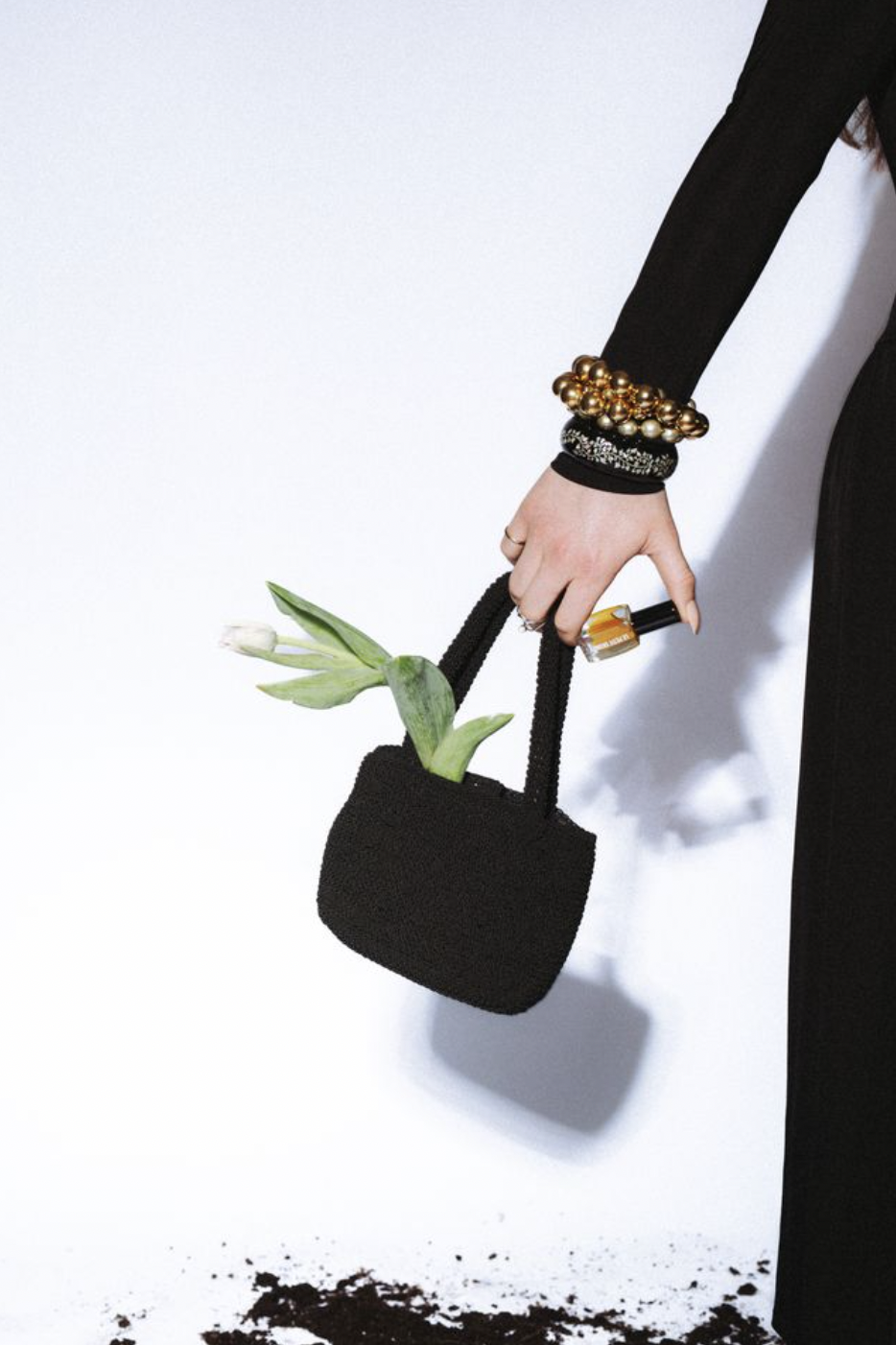 le petit skunk and mini black handbag