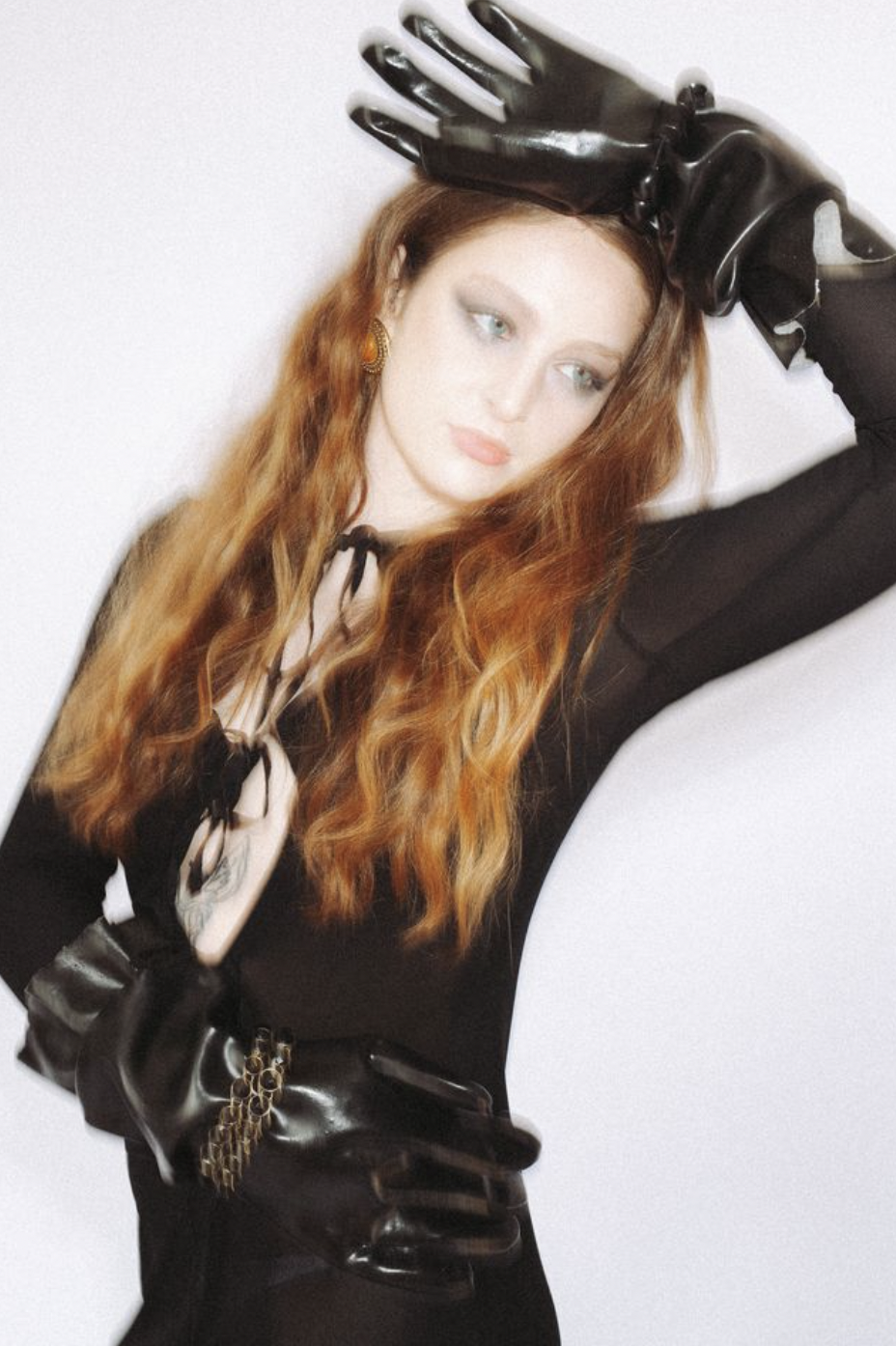 model blurred striking a pose