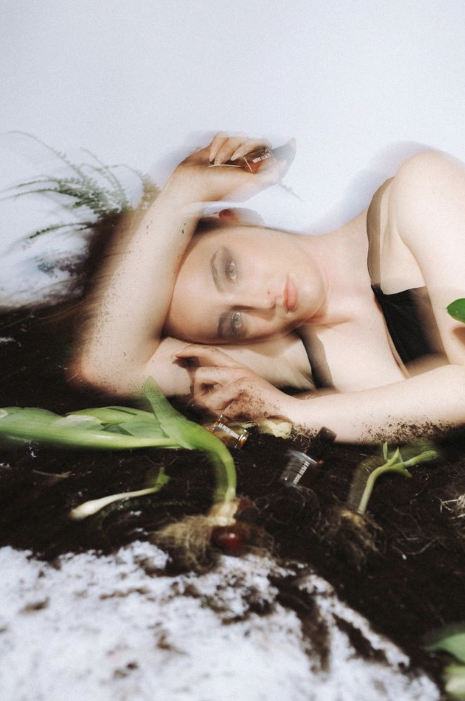 model in dirt with blurry aesthetic