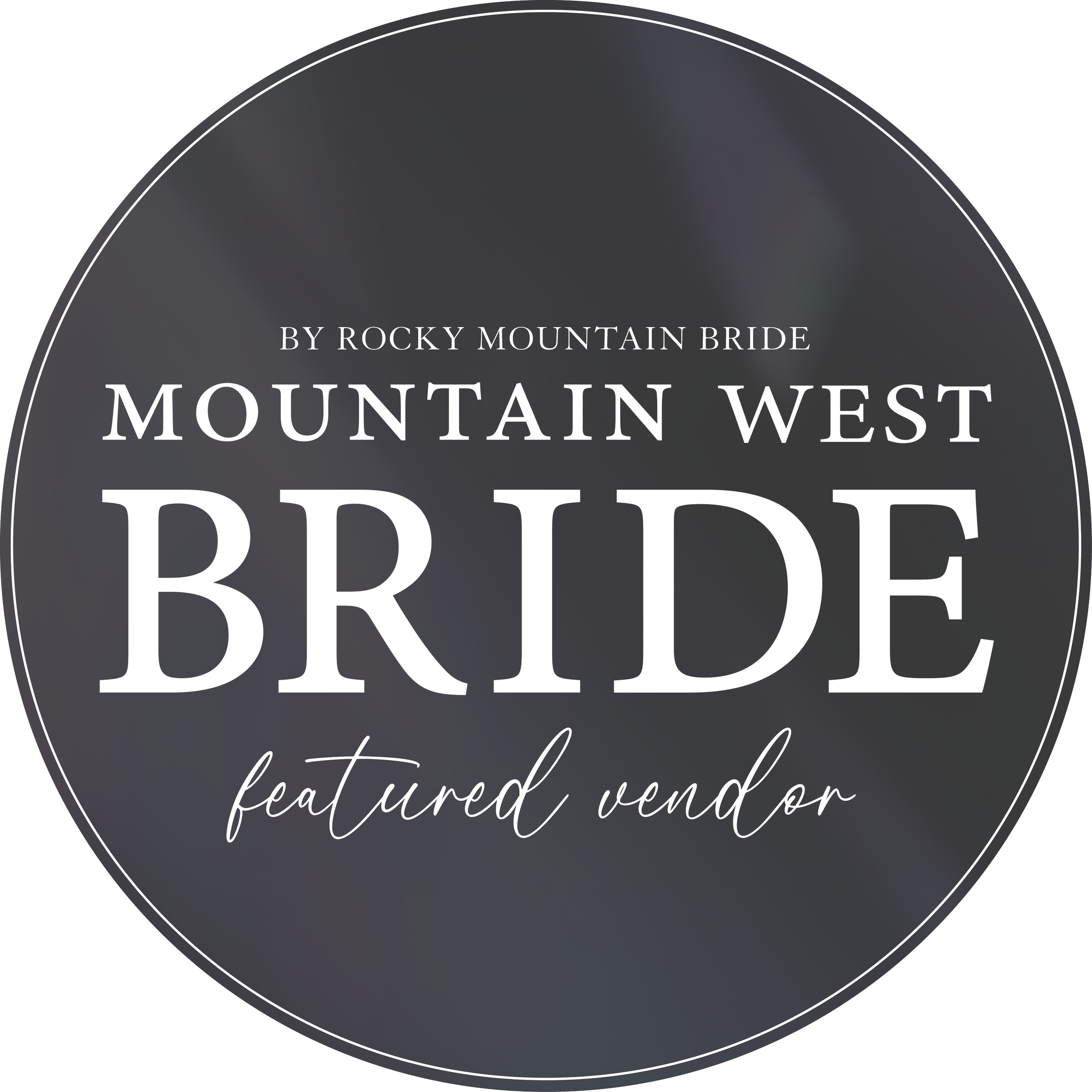 Close-up of a circular black wedding badge with white text reading 'Mountain West Bride' and 'featured vendor'.