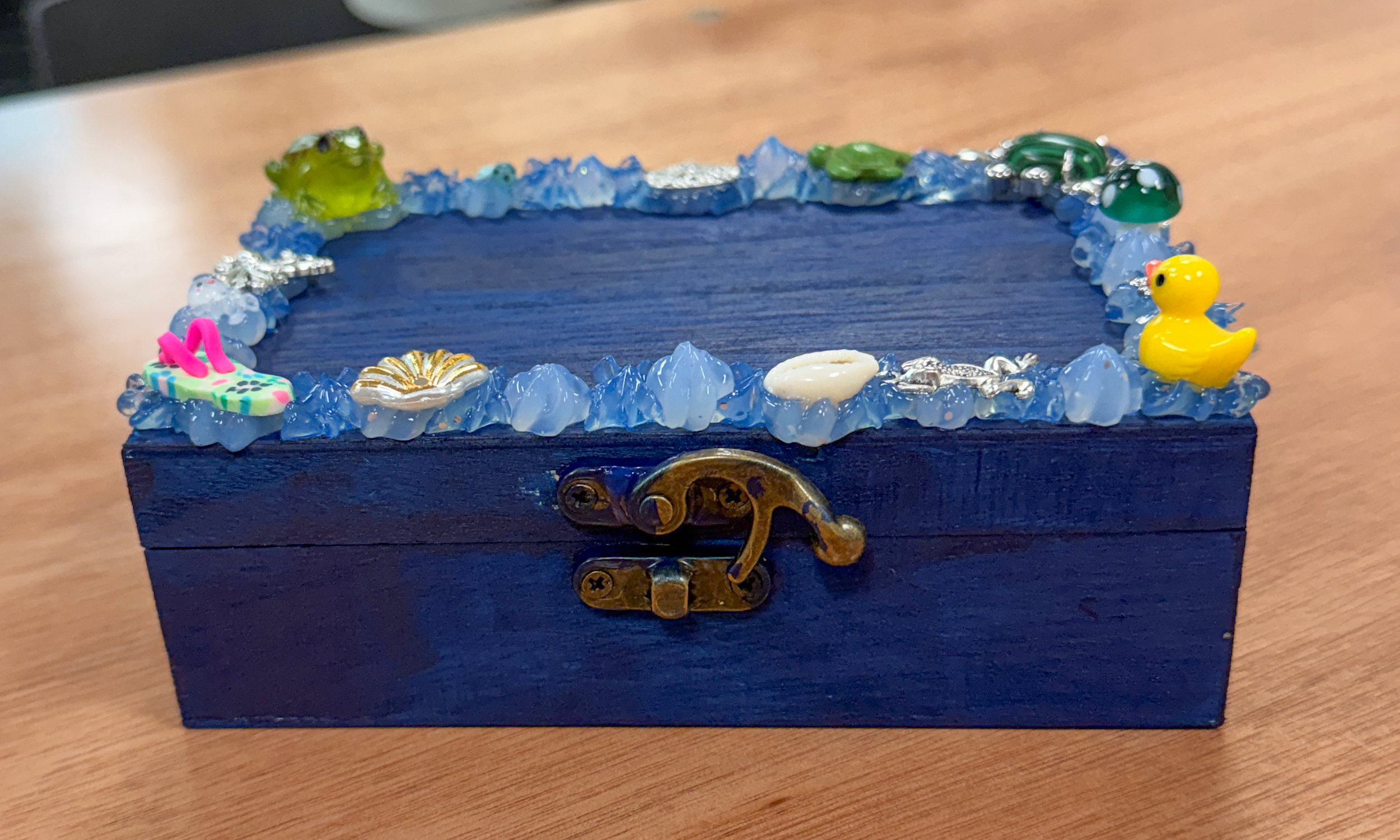 A trinket box painted and decorated