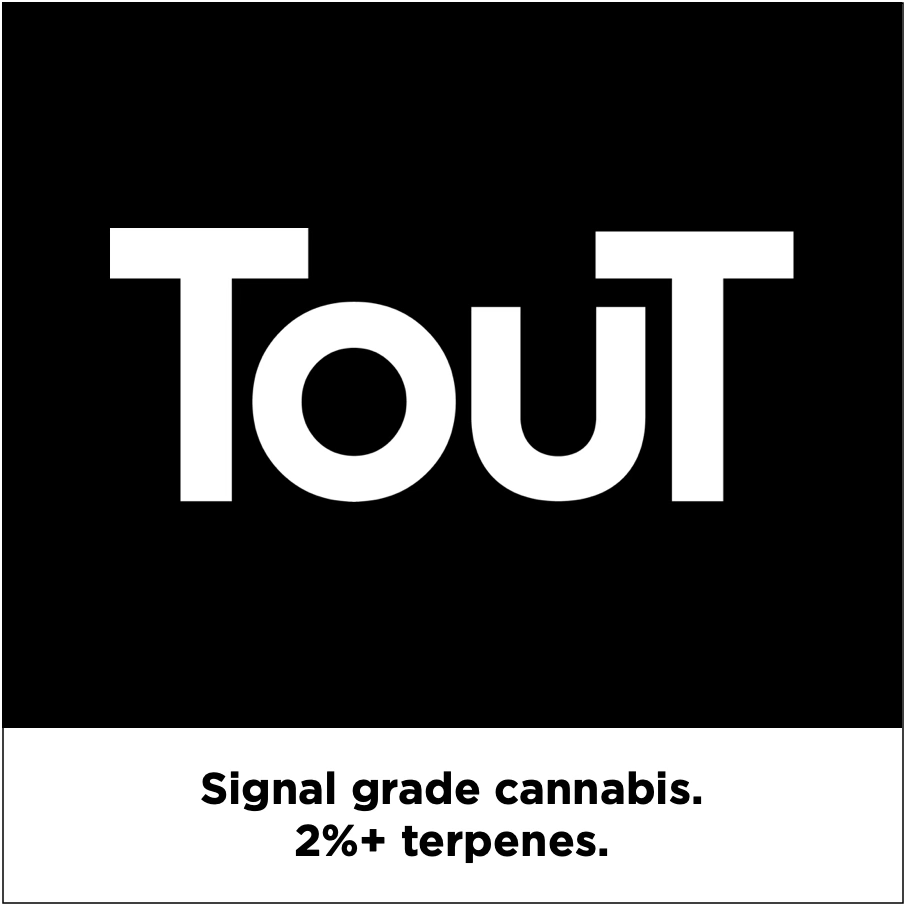 A black and white label with the word 'TOUT' in large bold letters. Below, it says 'Signal grade cannabis. 2%+ terpenes.'