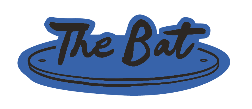 The Bat Logo, text "The Bat" resting on a pottery wheel bat.