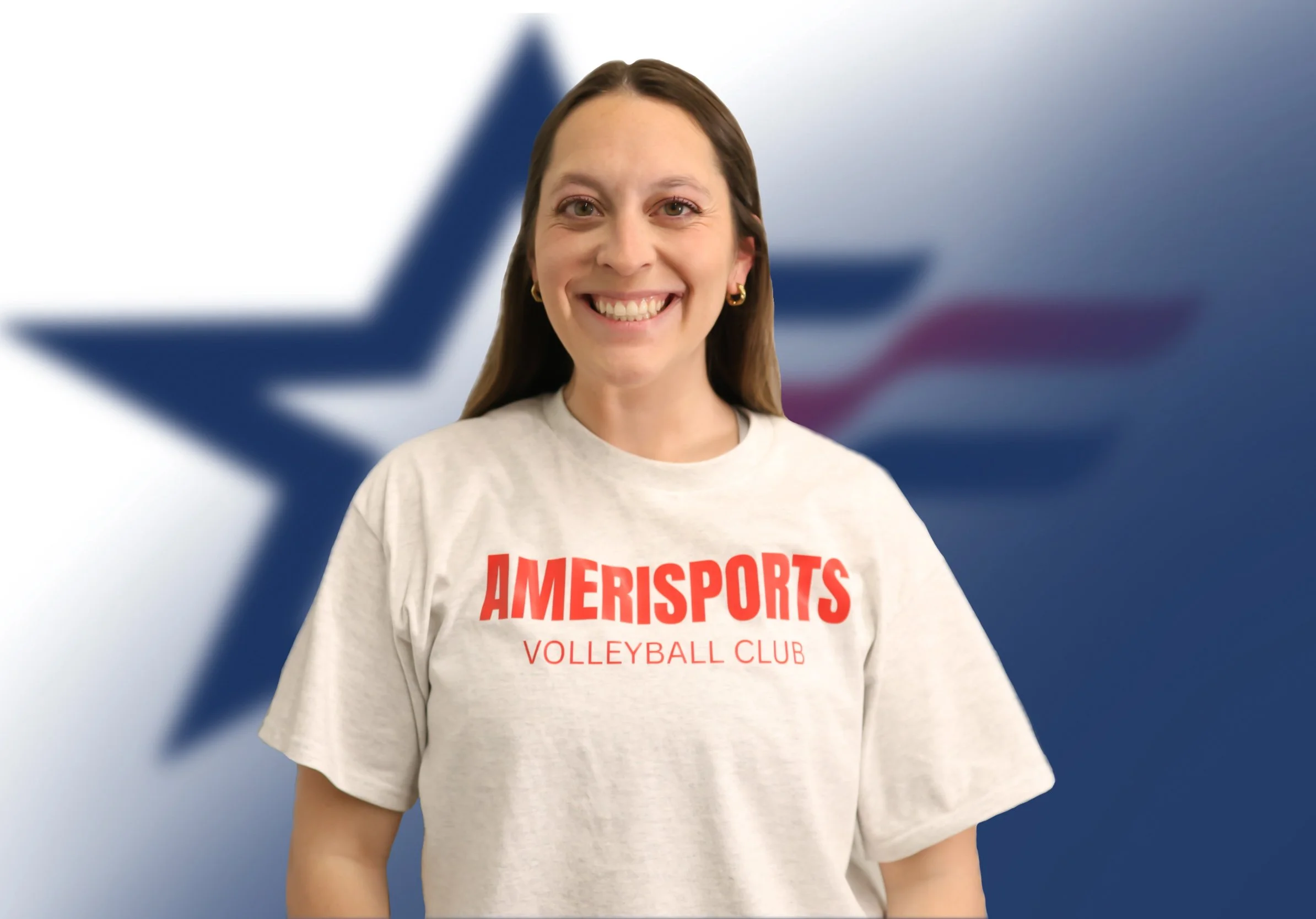 A young woman with long brown hair smiling, wearing a beige t-shirt with red text that reads 'AMERISPORTS VOLLEYBALL CLUB', standing in front of a blurred blue star background.