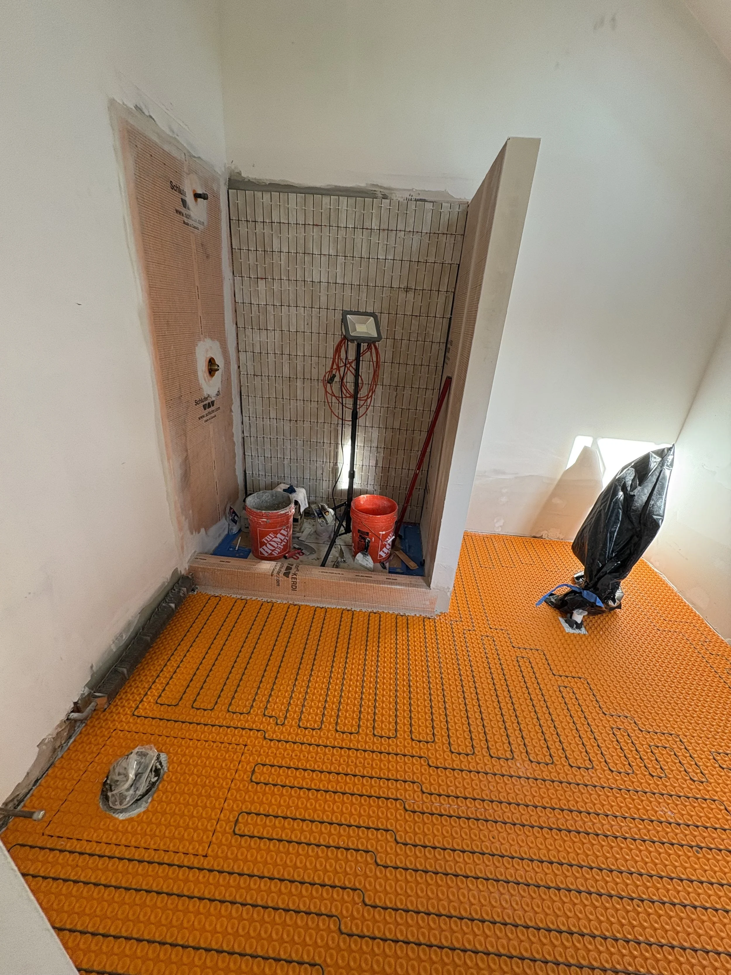Experience the comfort of a warm floor with Schluter® DITRA-HEAT installation. A modern solution that combines energy-efficient heating, waterproof protection, and long-lasting tile performance. contractor in New Jersey design and build installation