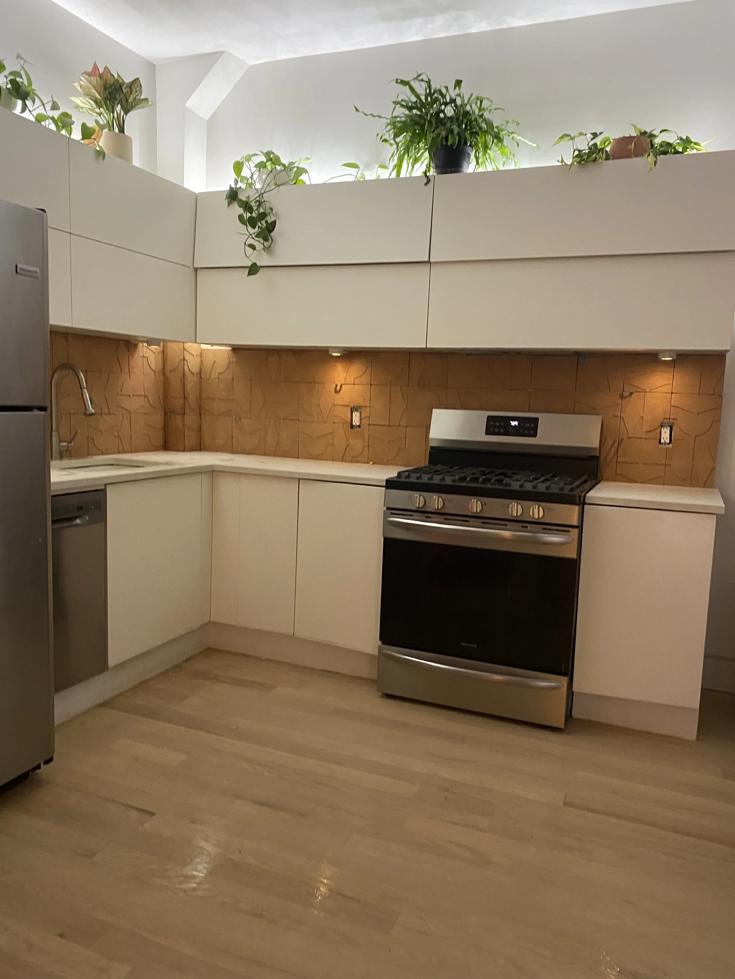 A modern kitchen custom tile, a marble countertop, licensed Insured Bonded home improvement contractor in New Jersey design and build installaltion free estimate
