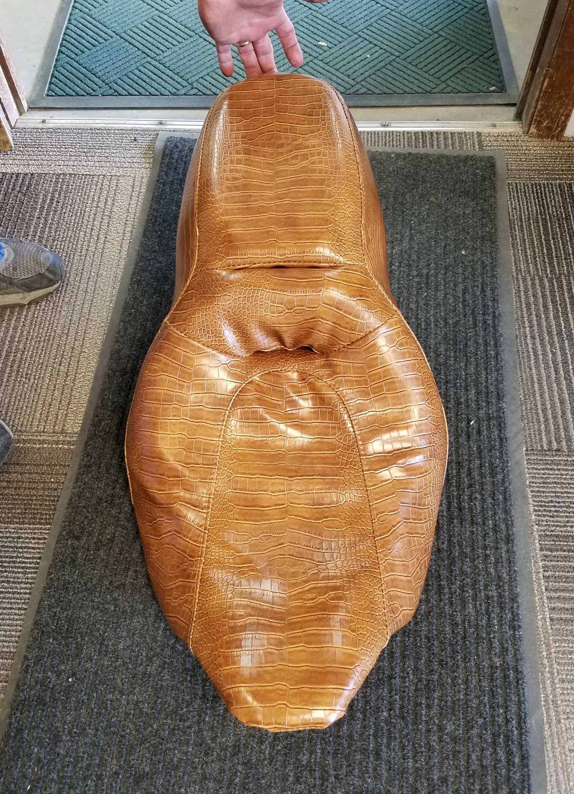 Top-down view of a seat with a crocodile-skin pattern