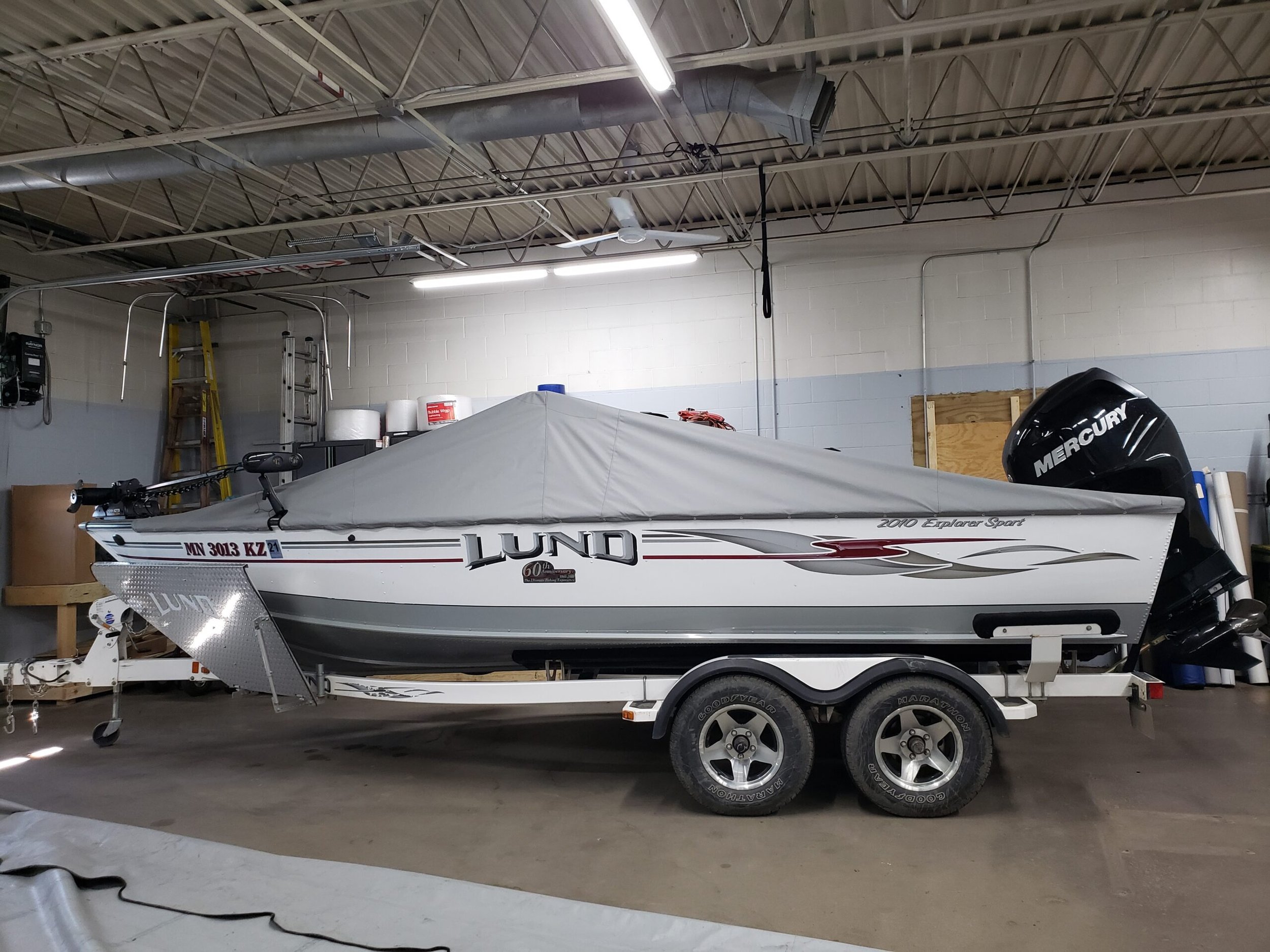 Boat with grey custom cover
