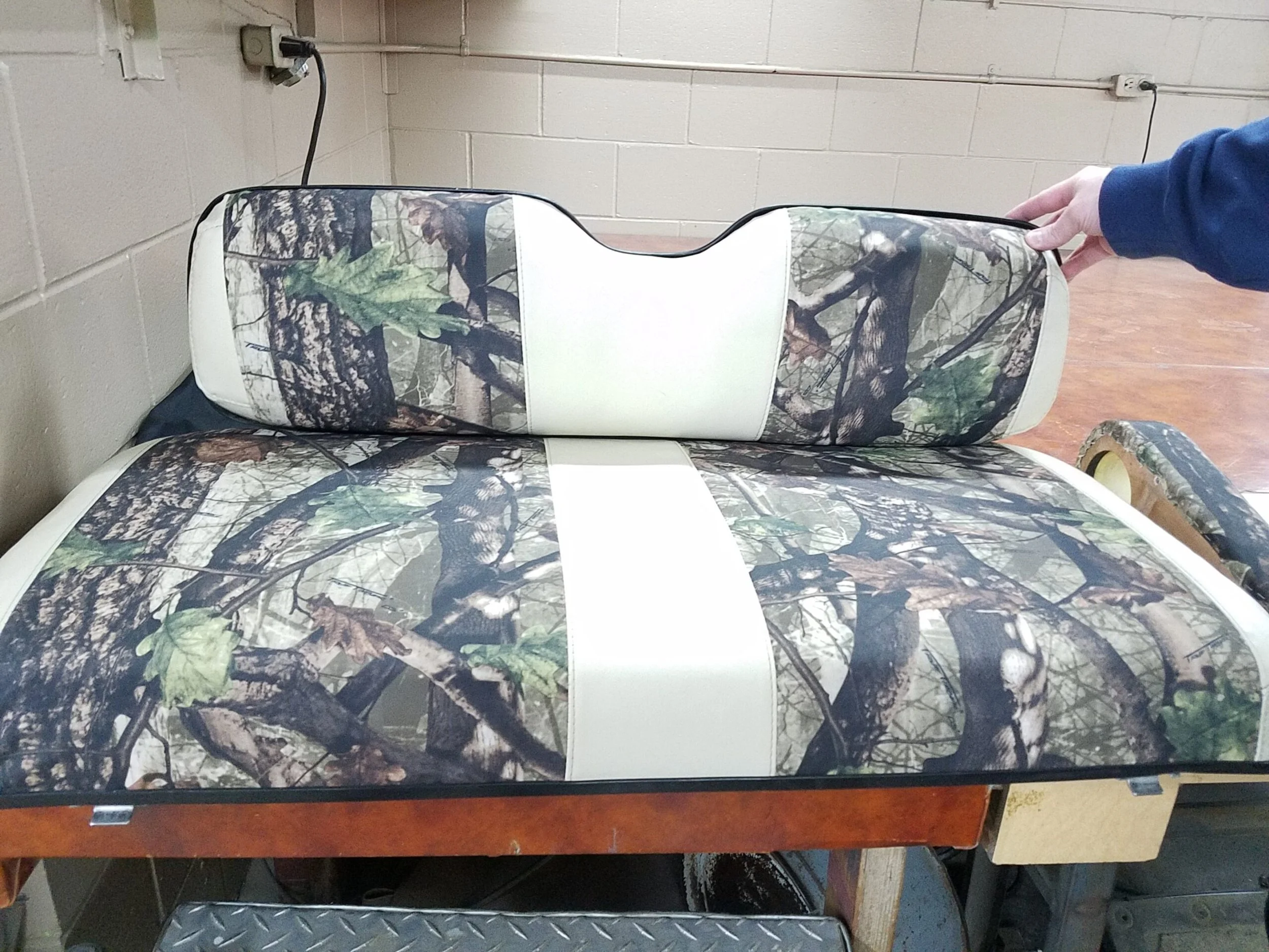 Camouflage-patterned golf cart seat