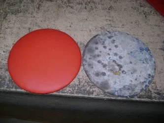 New red stool cover to replace one on the right.