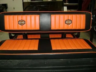 Orange and black Harley-Davidson golf cart seat