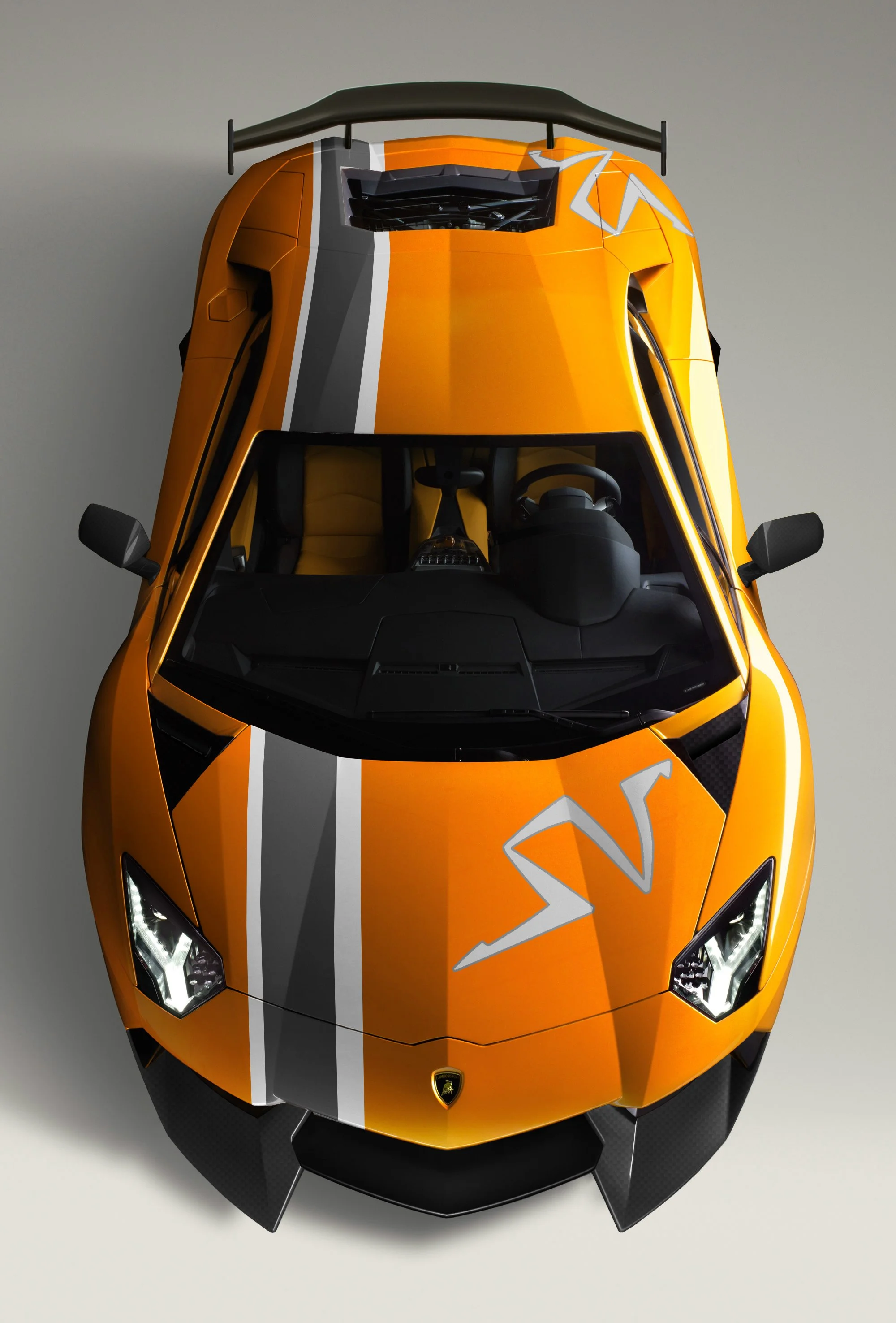 Top Gear illustration of a Lamborghini Aventador SV, top view showing black accents, racing stripes, and rear wing