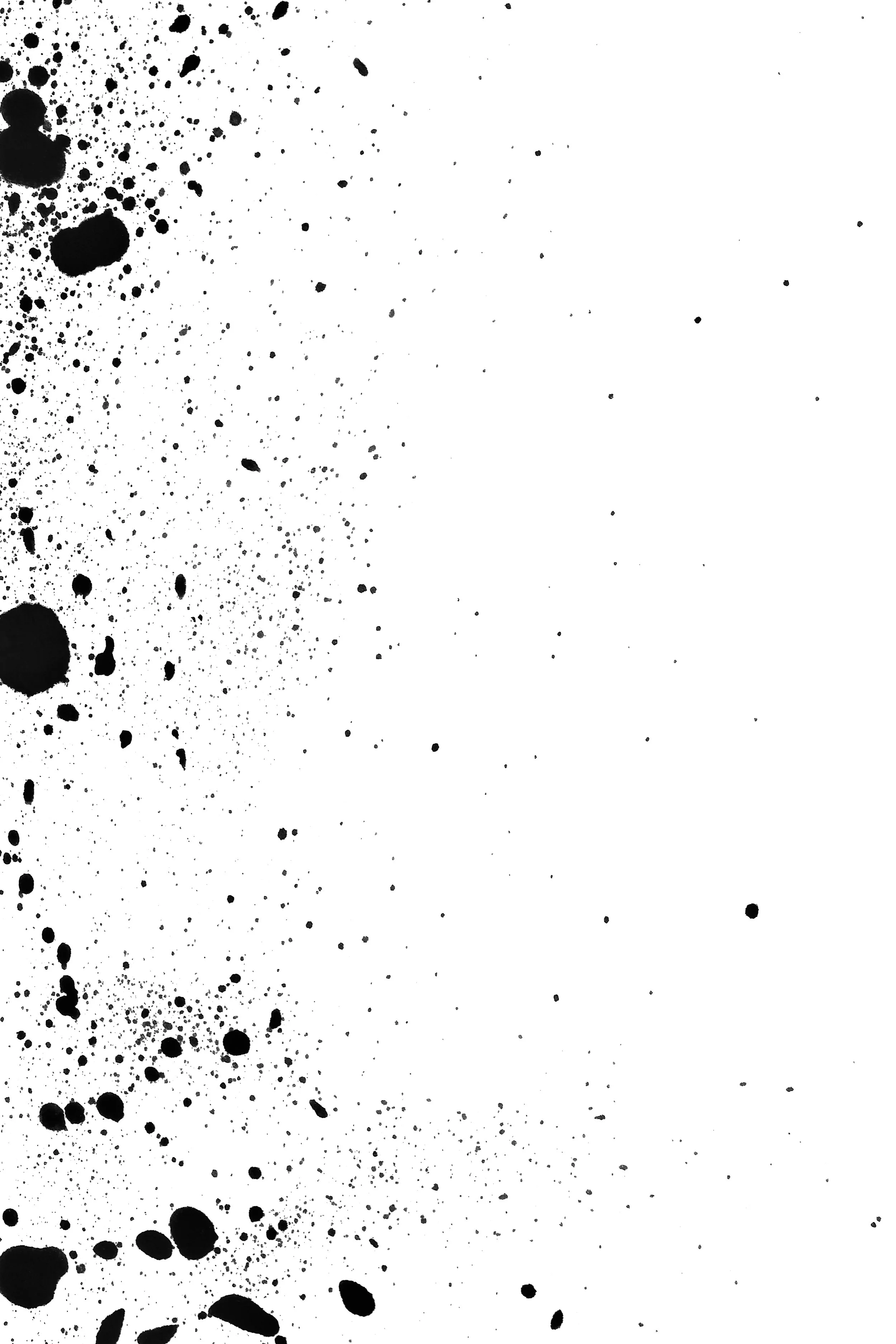 Black ink splatters on a white background, with larger splatters clustered on the left and smaller ones dispersed across the right.