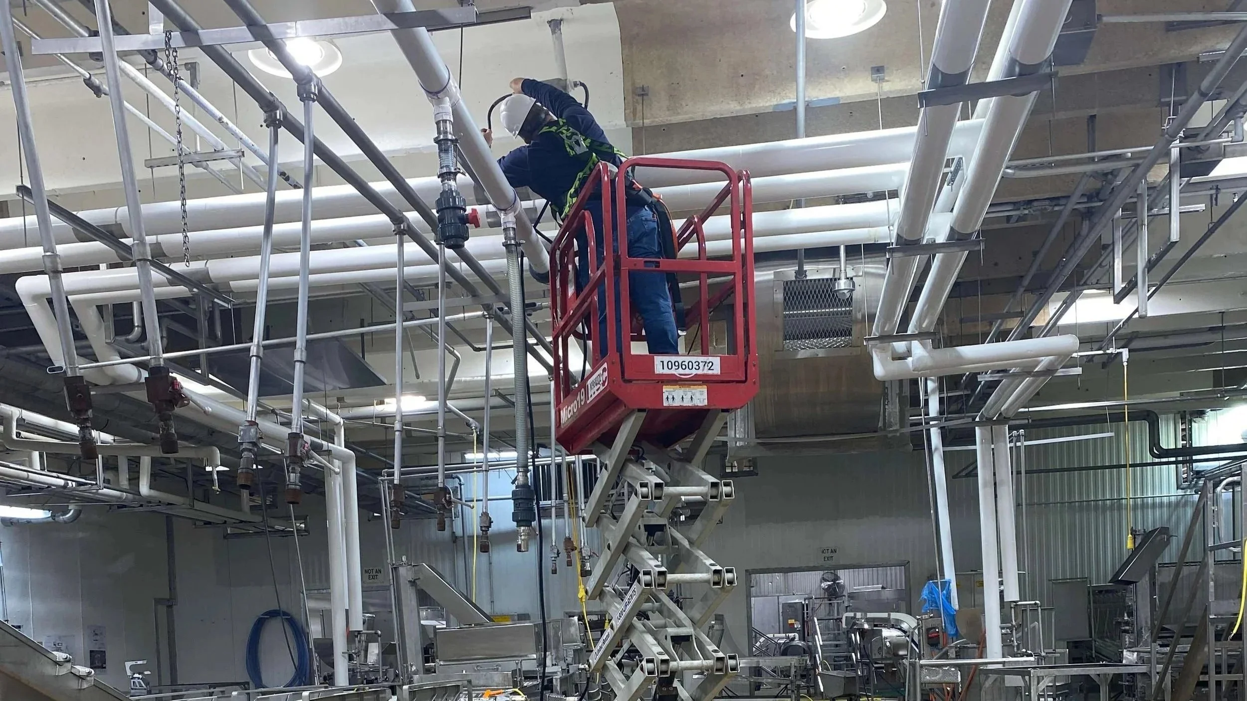 One of our team members working in an industrial panel
