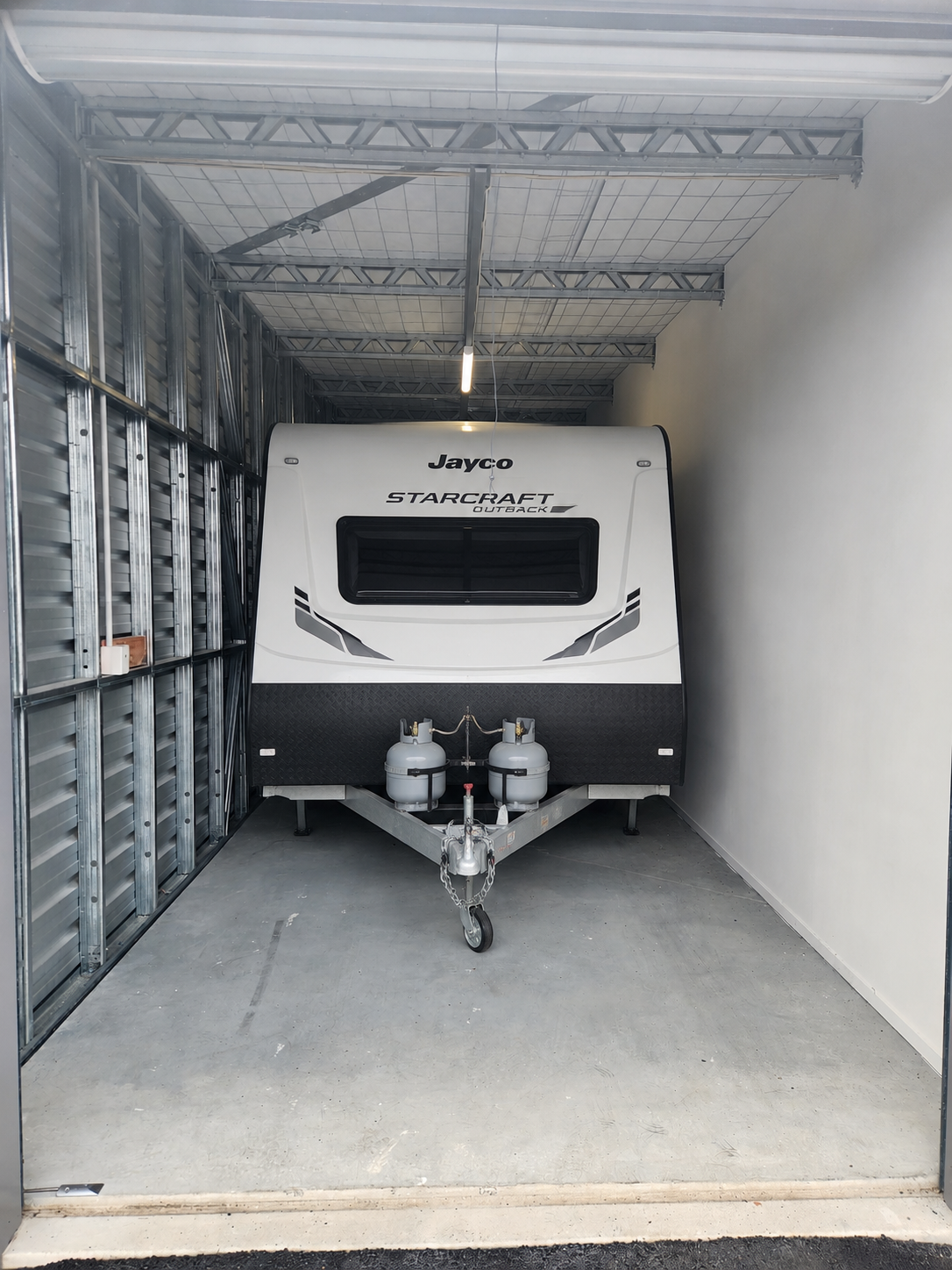 Indoor caravan storage at Myt4you Storage Ravenswood with secure enclosed unit, 24/7 access, individual alarm and CCTV monitoring near Woodend, Pegasus and North Christchurch.