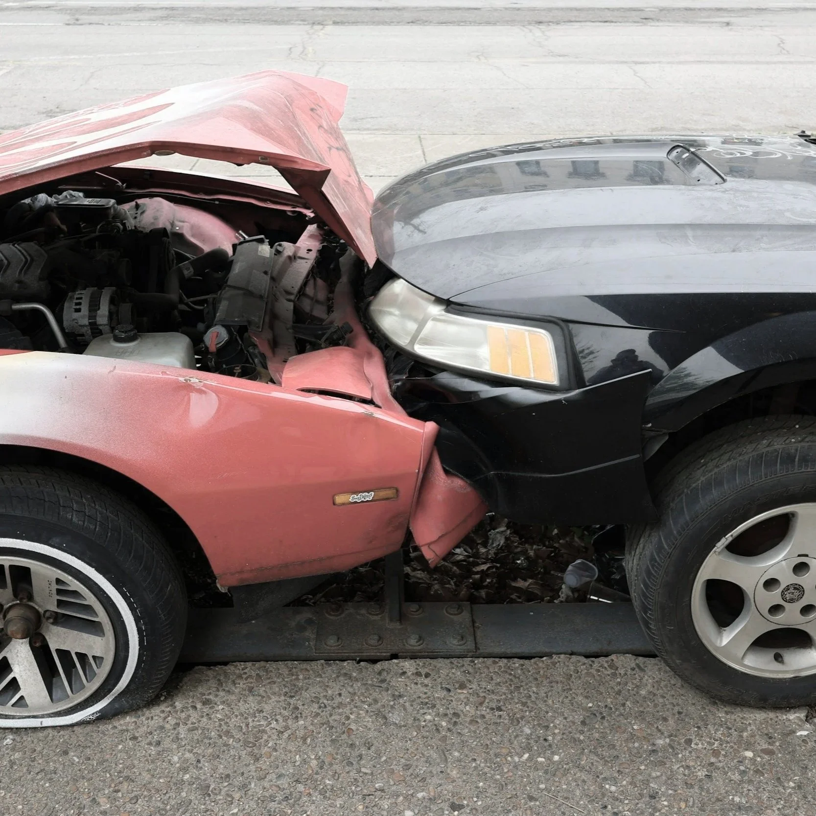 Two vehicles in a crash that may have caused injury to the drivers