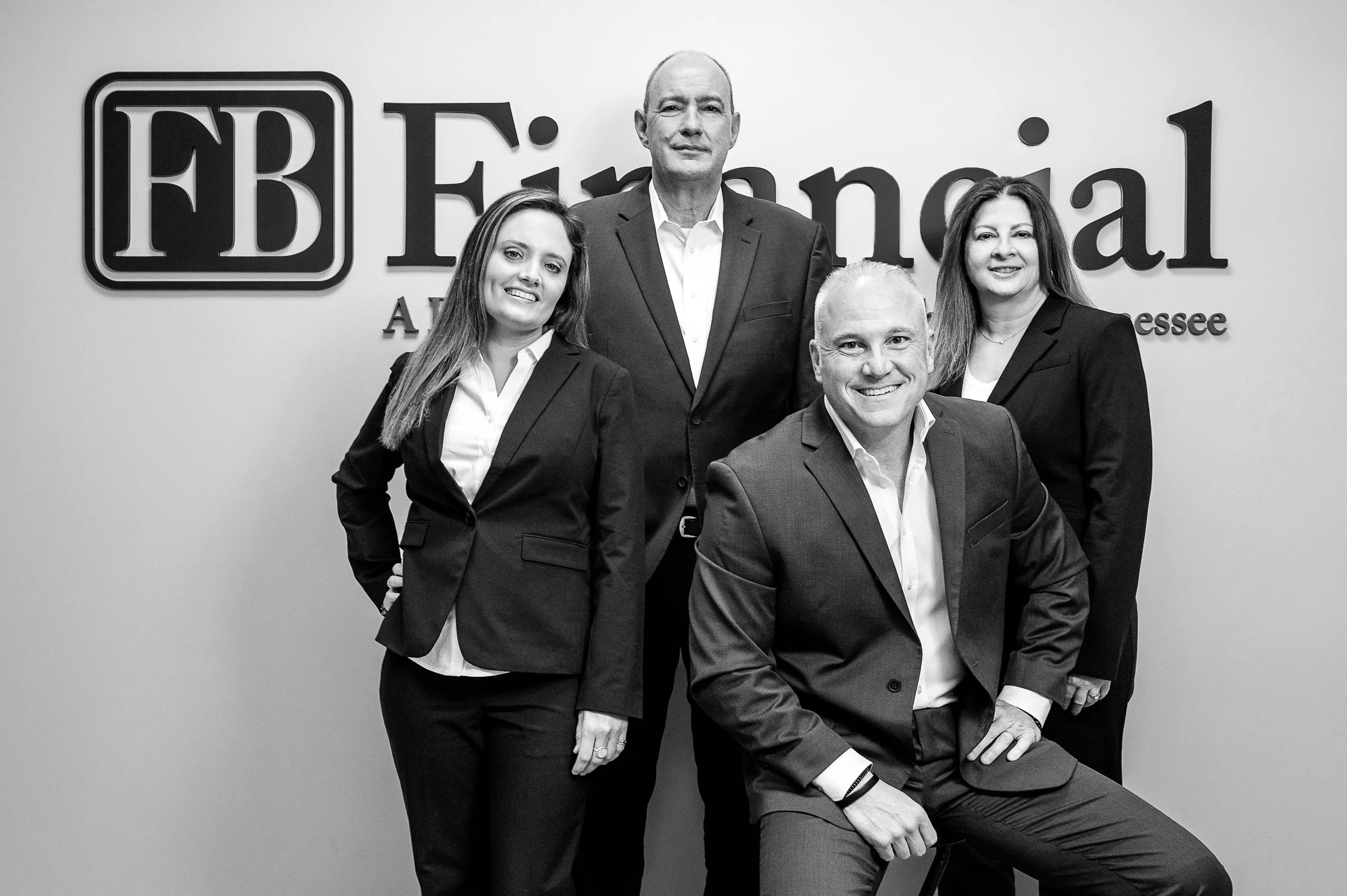 FB Financial team members standing together in the office, representing the company's collaborative and people-first culture.