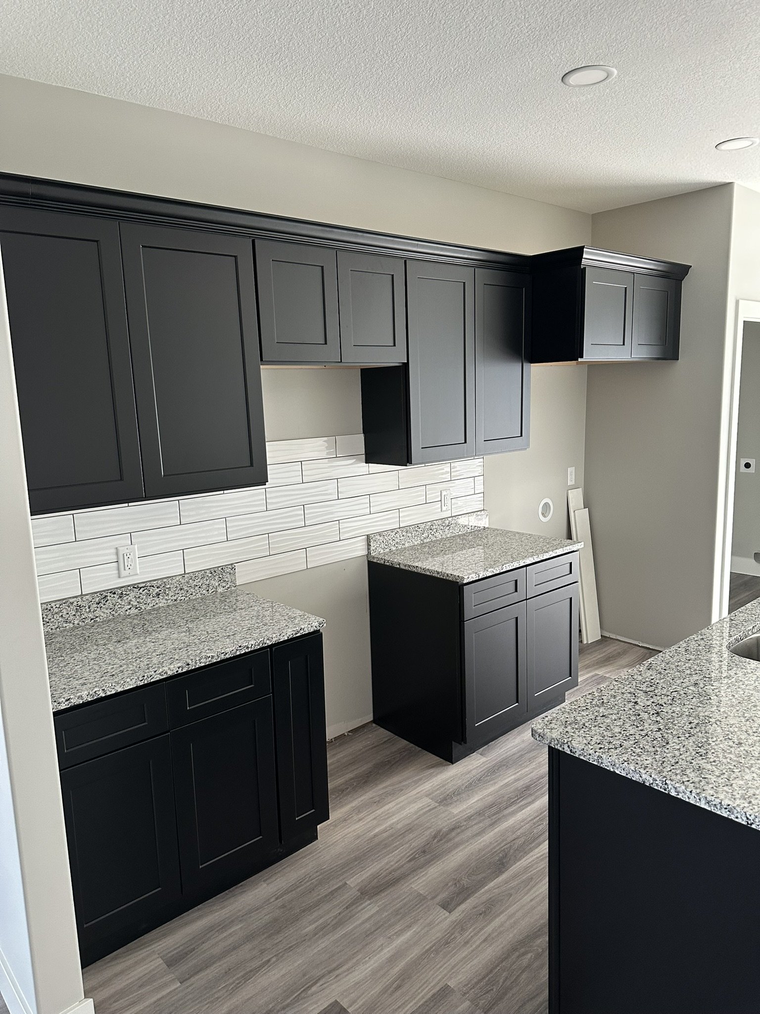 New cabinet and backsplash install