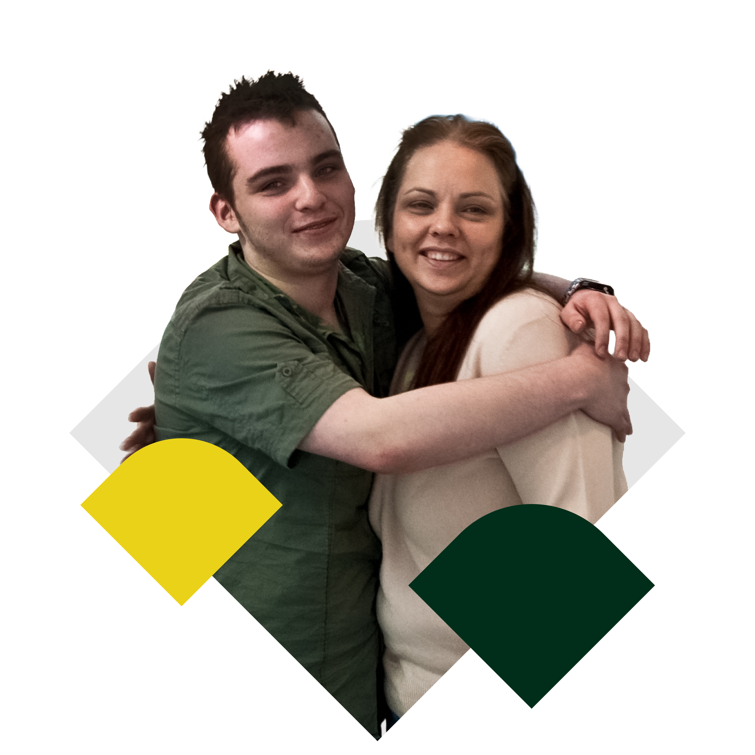 Photo of Ciaran and Celine hugging and looking towards the camera