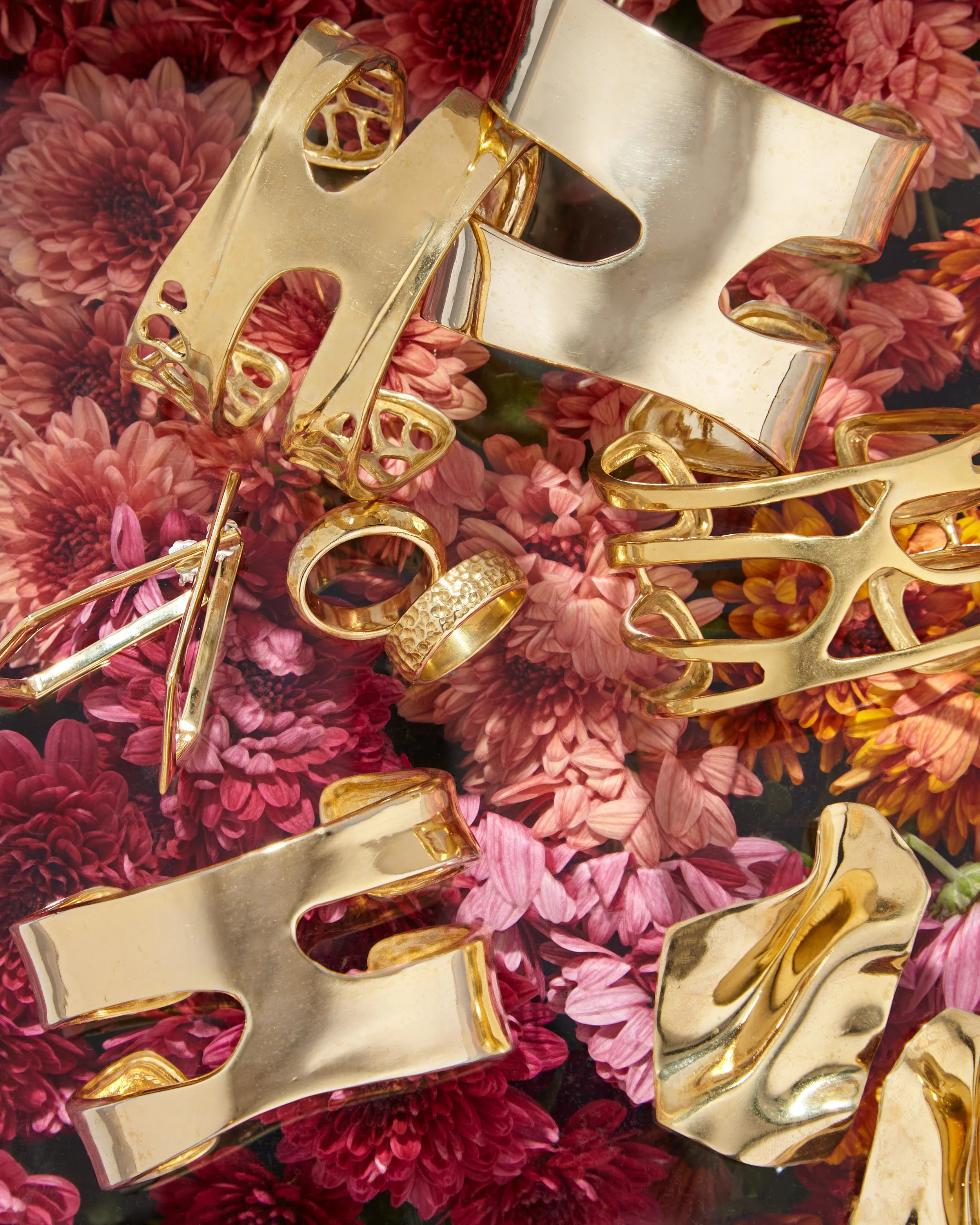 Product Still Life image of fashion Jewelry by Katherine Lincoln and Floral photographer Gabrielle Gabe Weber and Stylist Hope Misterek