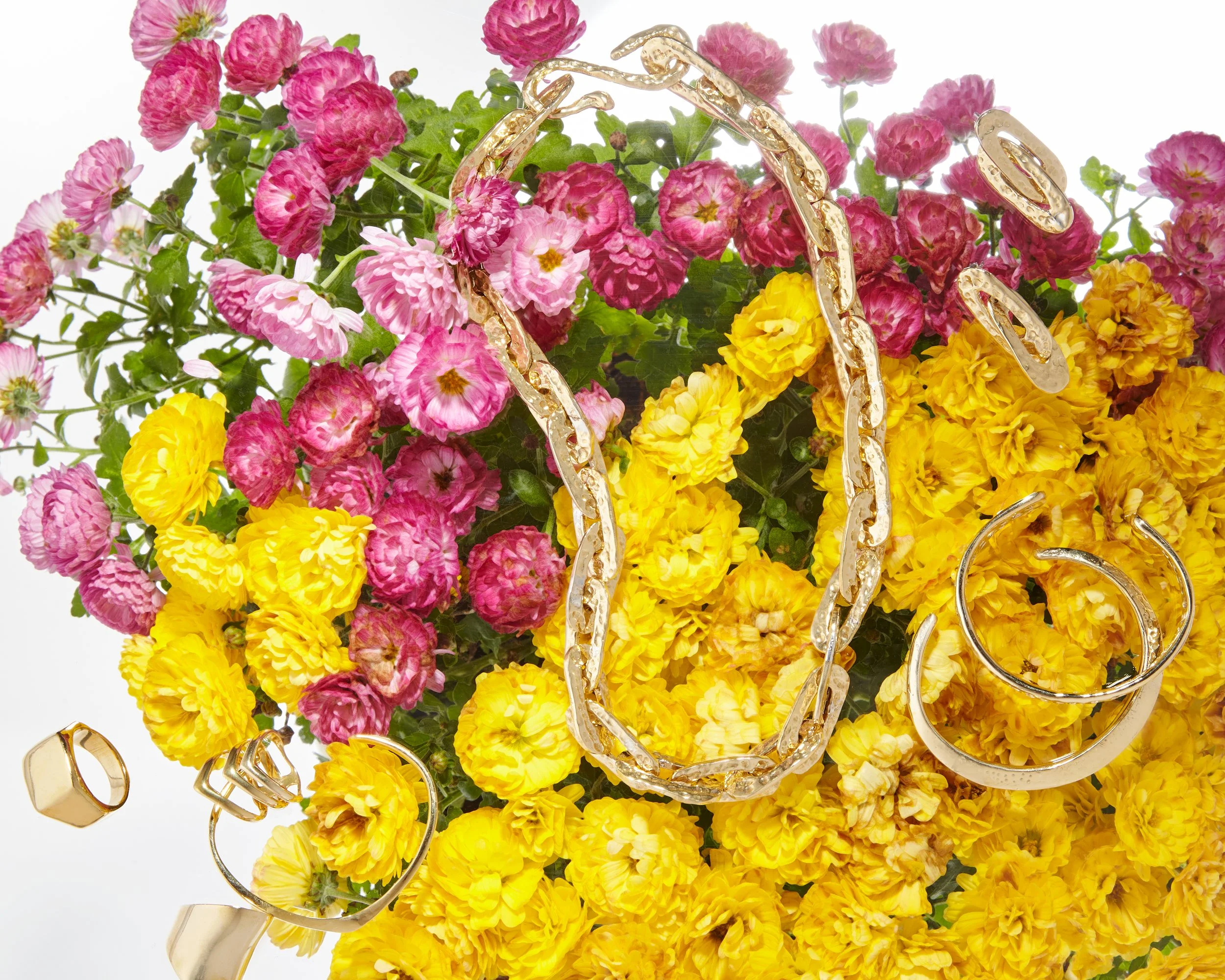 Product Still Life image of fashion Jewelry by Katherine Lincoln and Floral photographer Gabrielle Gabe Weber and Stylist Hope Misterek