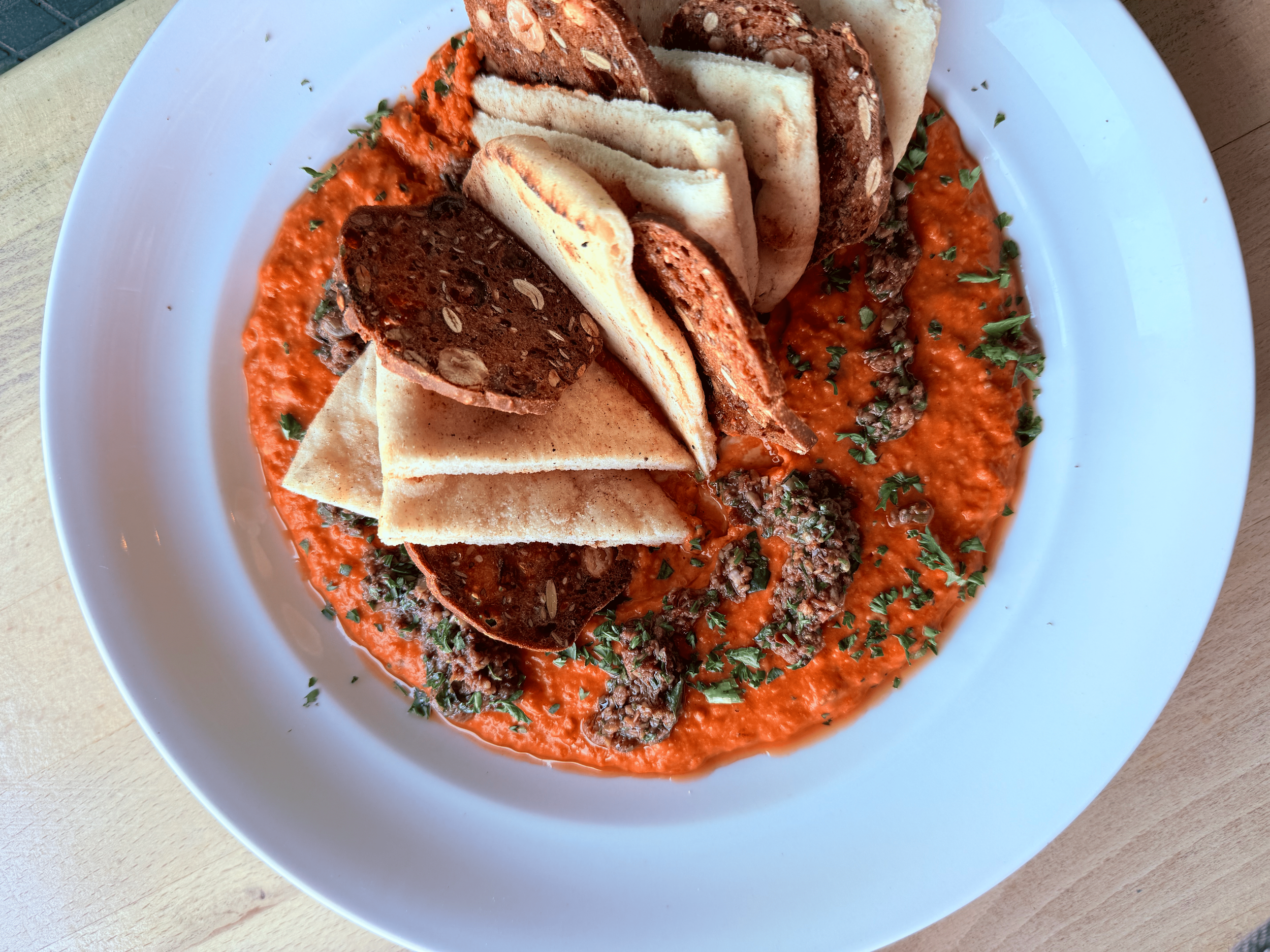 Roasted Pepper Hummus
Tapenade, pita & crisps finished with olive oil.