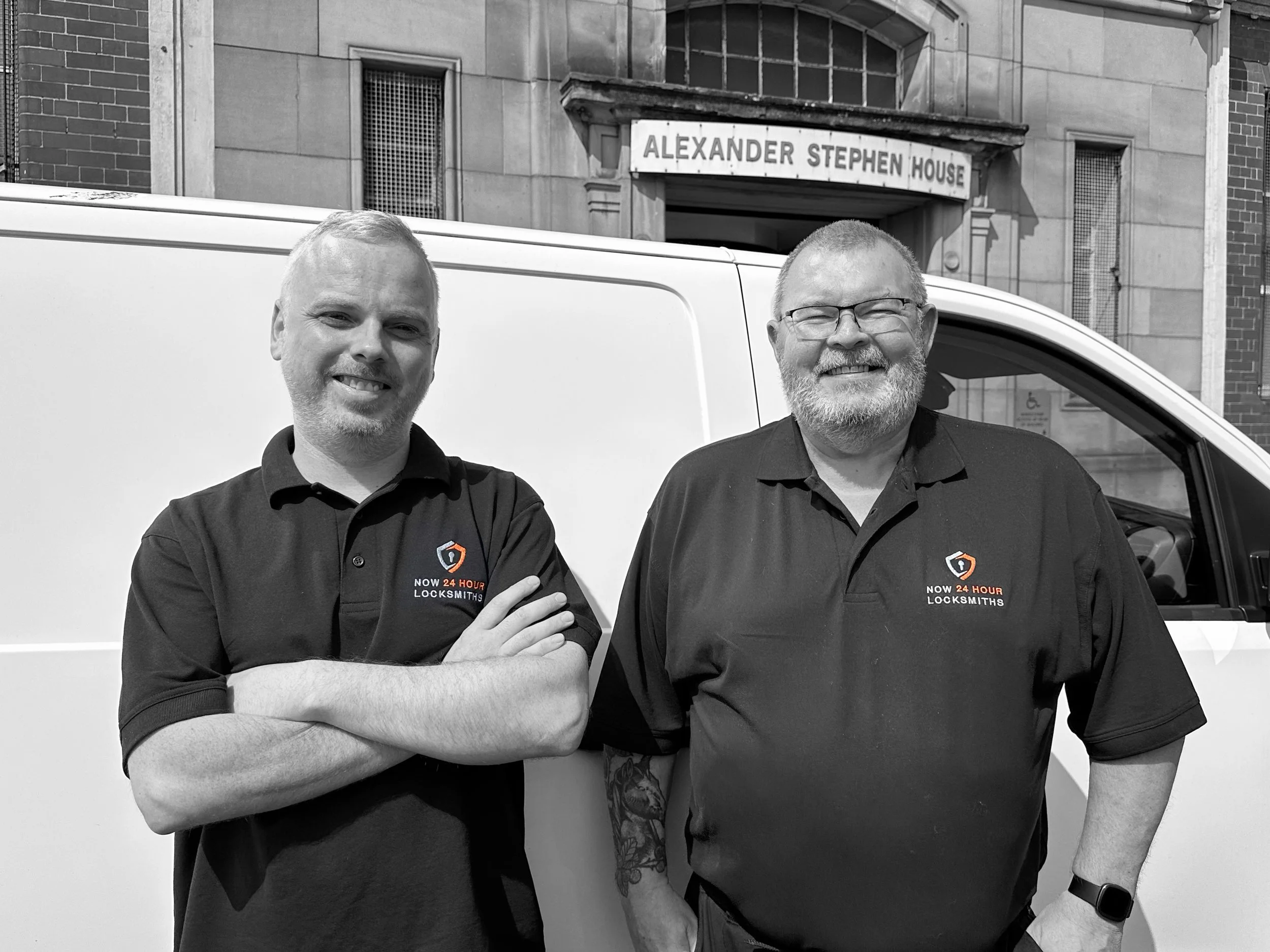 Robert junior and Robert senior standing in front of their van