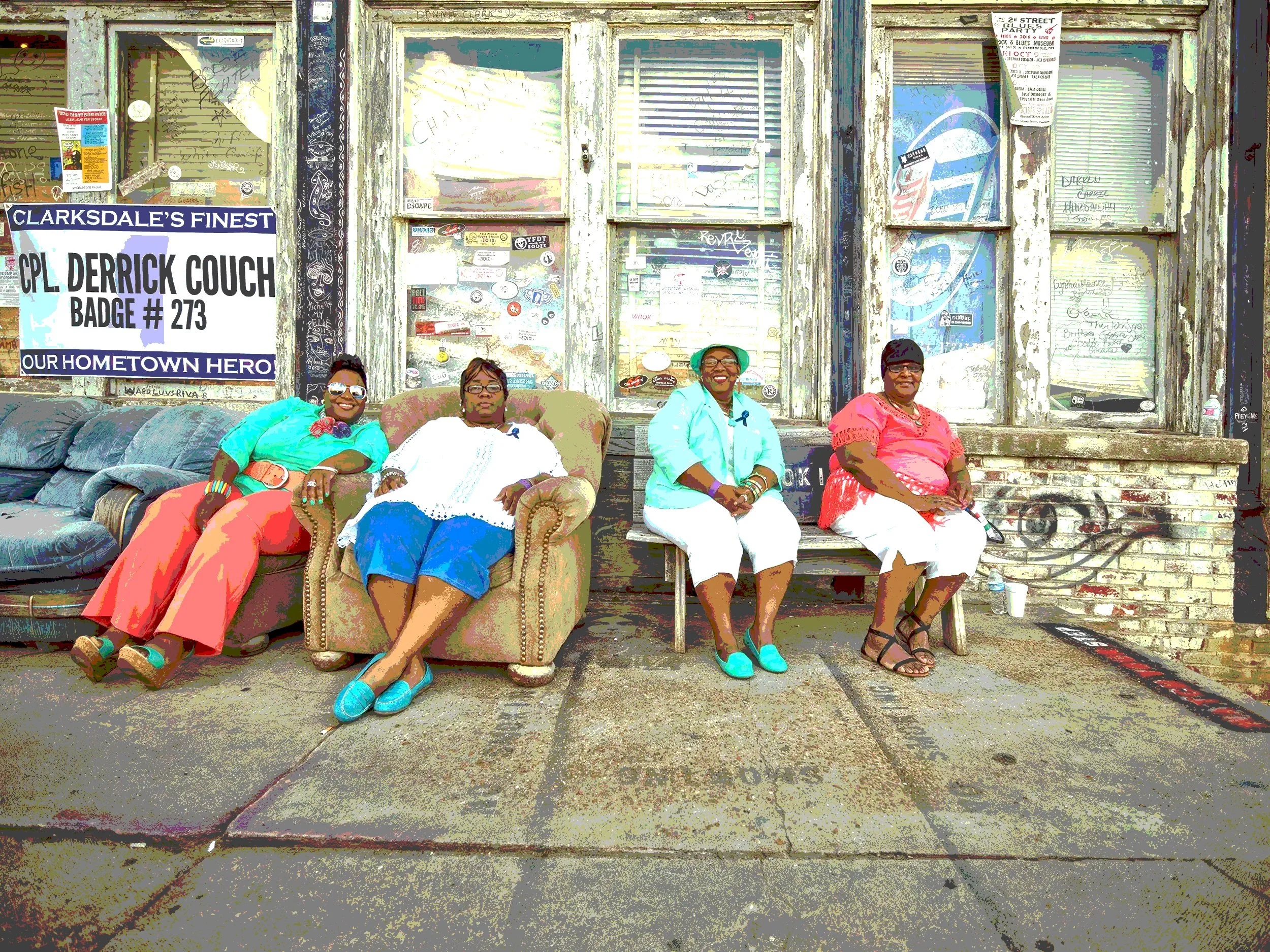 Four women sitting together outside Ground Zero Blues Club in Clarksdale, Mississippi