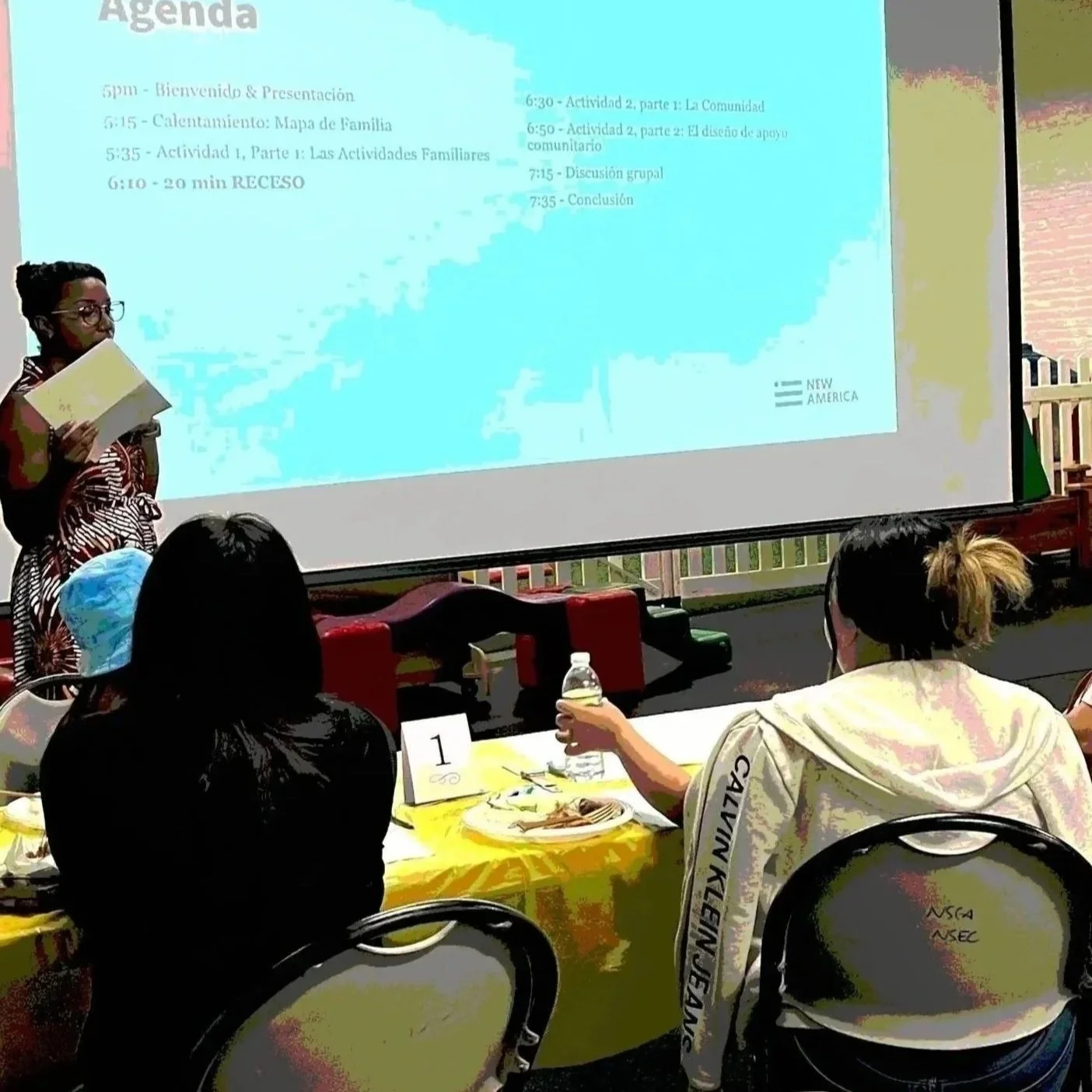 Keara, founder of The South Design Research Studio, presenting to families during a research session for the safety net redesign study