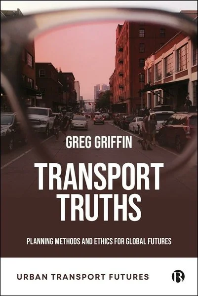 Book cover titled 'Transport Truths' by Greg Griffin, with subtitle 'Planning Methods and Ethics for Global Futures,' showing an urban street scene viewed through sunglasses, featuring cars and buildings.