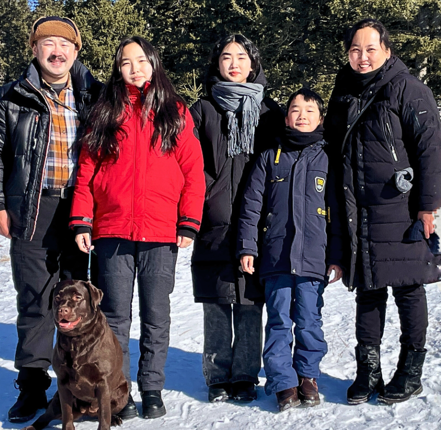 Family of evangelist's with Asian Outreach, standing together in the snow.