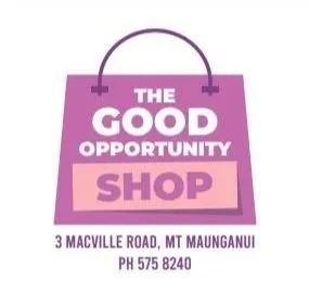 A purple shopping bag with white and pink text that reads 'The Good Opportunity Shop', including its address and phone number, 3 Macville Road, Mt Maunganui, PH 575 8240.