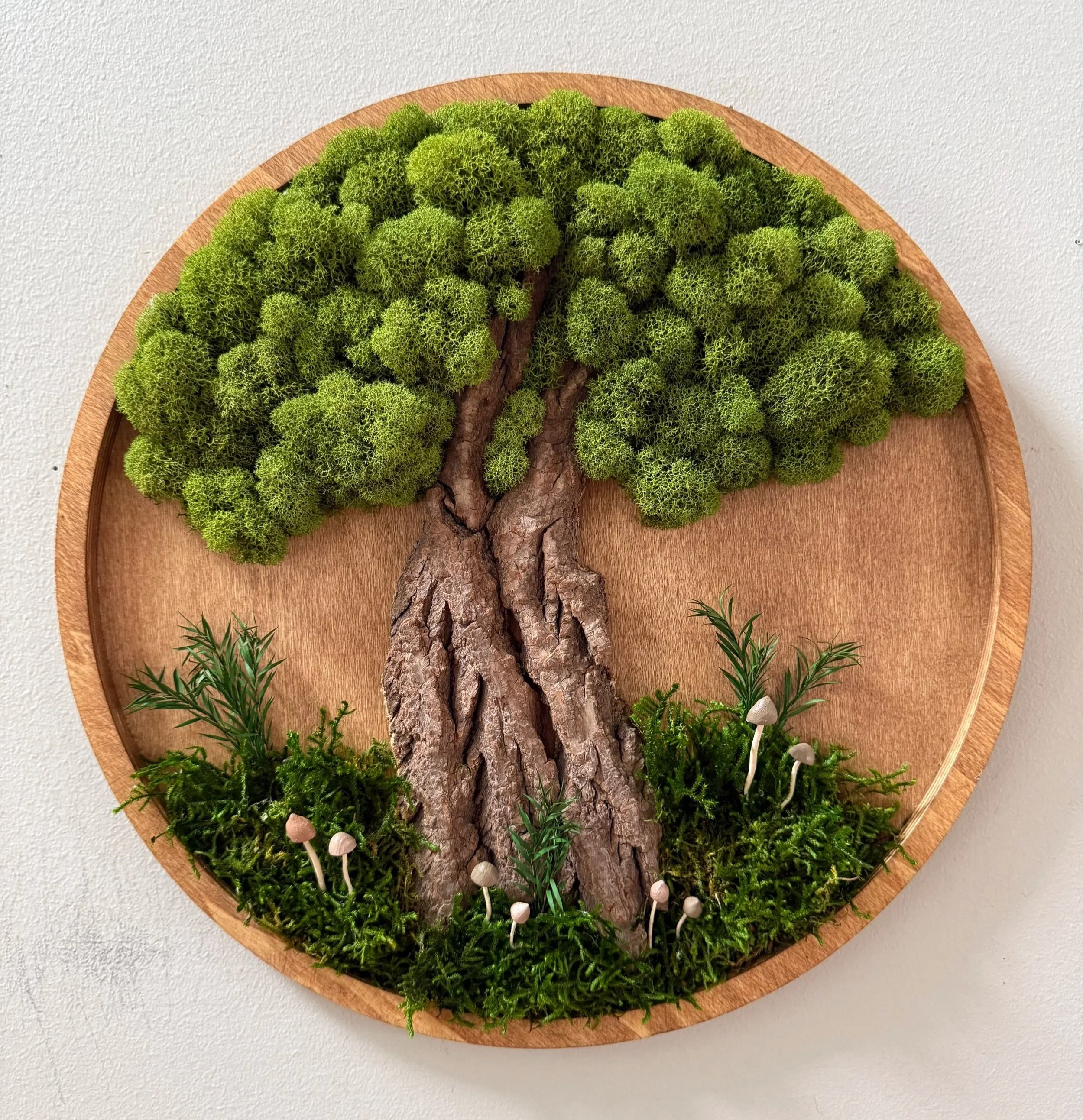 Title: Moss Tree
Artist: Jill Anulewicz, Mushrooms and Moss, etc. 
Instagram: @Mushroomsandmossetc
About this piece: Using only natural materials, I recreated a majestic, magical tree highlighting all the beautiful textures pulled right from nature. 